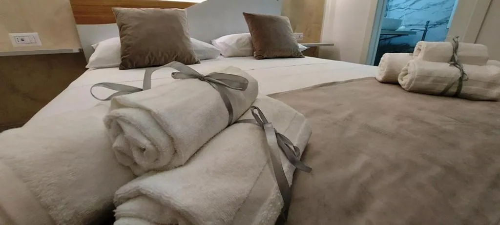 Bed in IL GIGLIO B&B