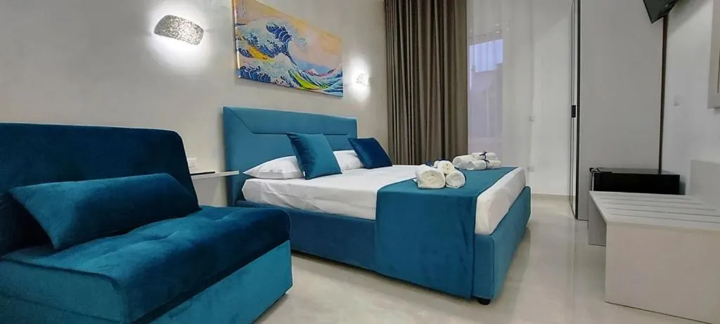 Bed in IL GIGLIO B&B