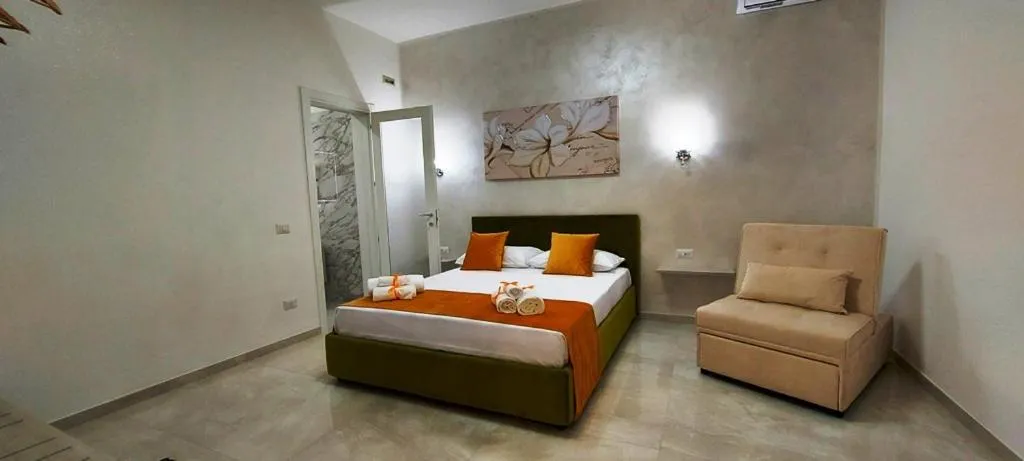 Bed in IL GIGLIO B&B