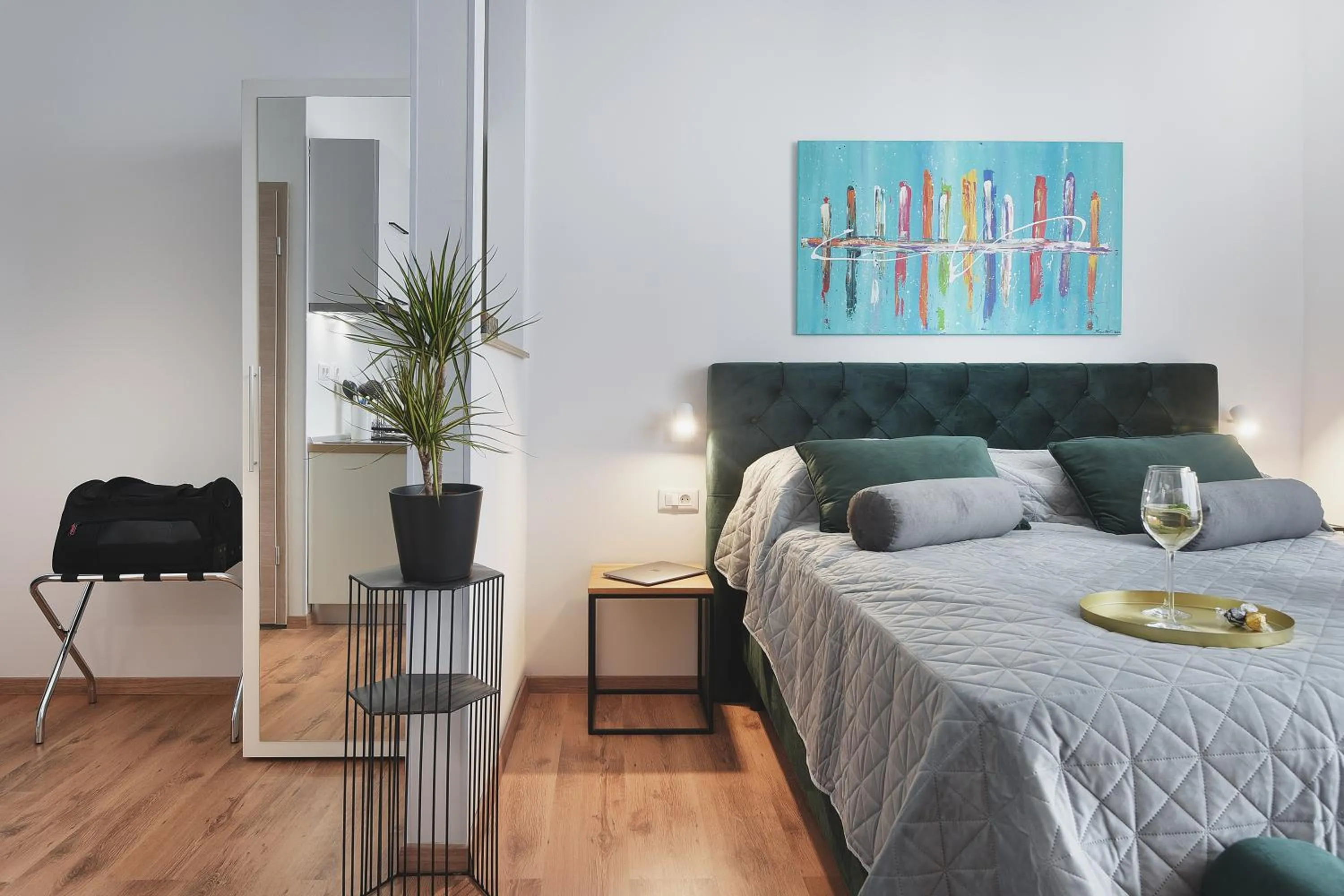 Bed in Emi Luxury Apartments