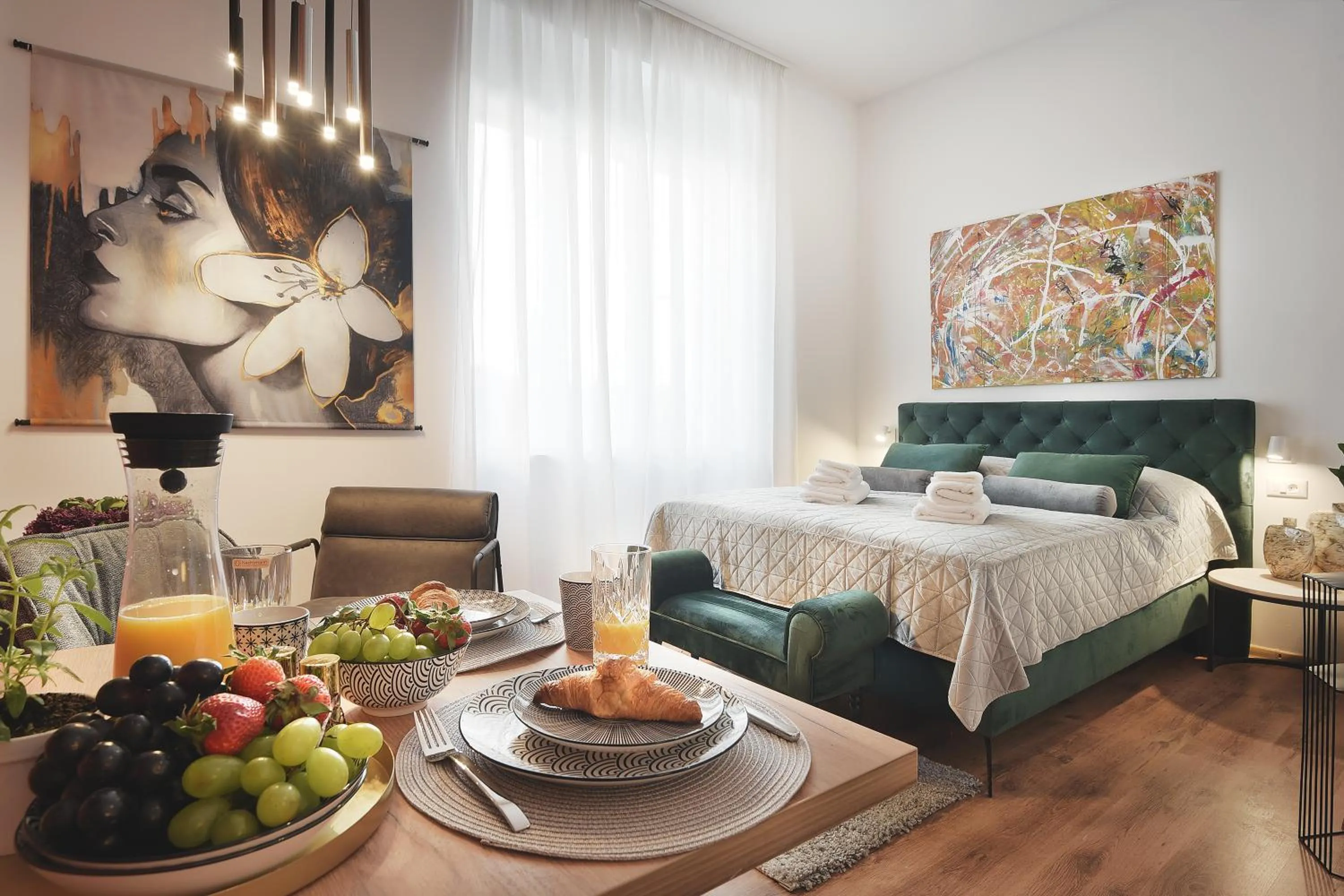 Bed in Emi Luxury Apartments