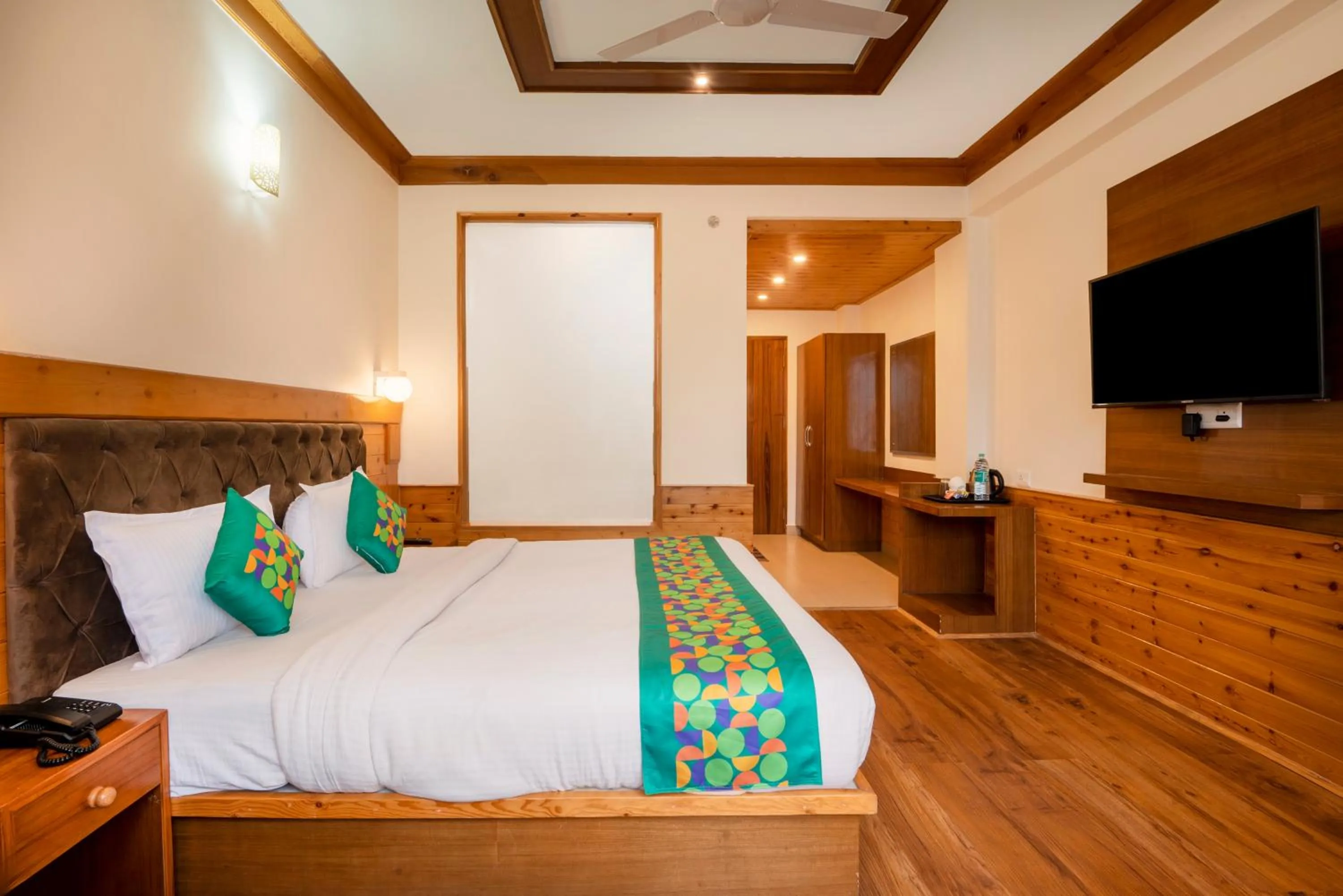 Bedroom, Bed in Treebo Premium Sattva With Mountain View