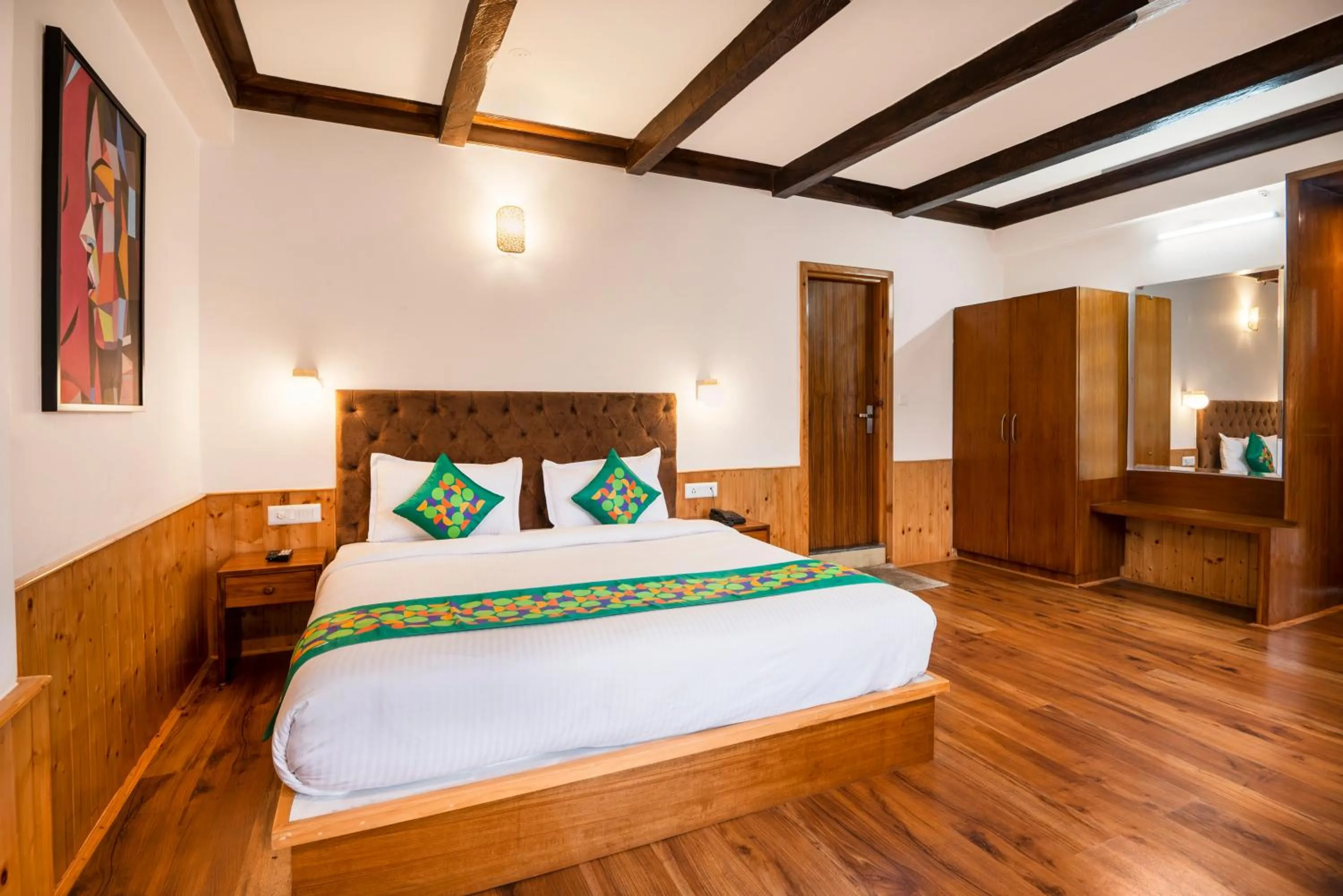 Bedroom, Bed in Treebo Premium Sattva With Mountain View