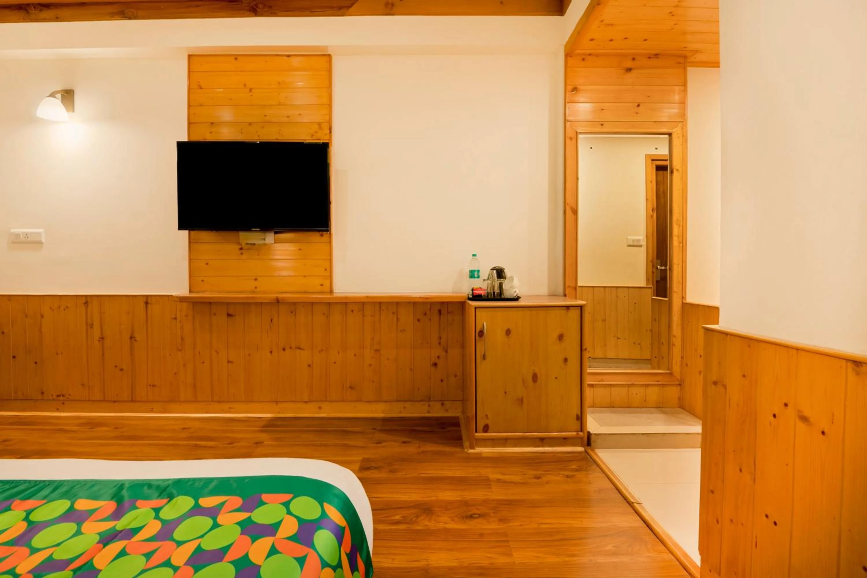 Bed in Treebo Premium Sattva With Mountain View