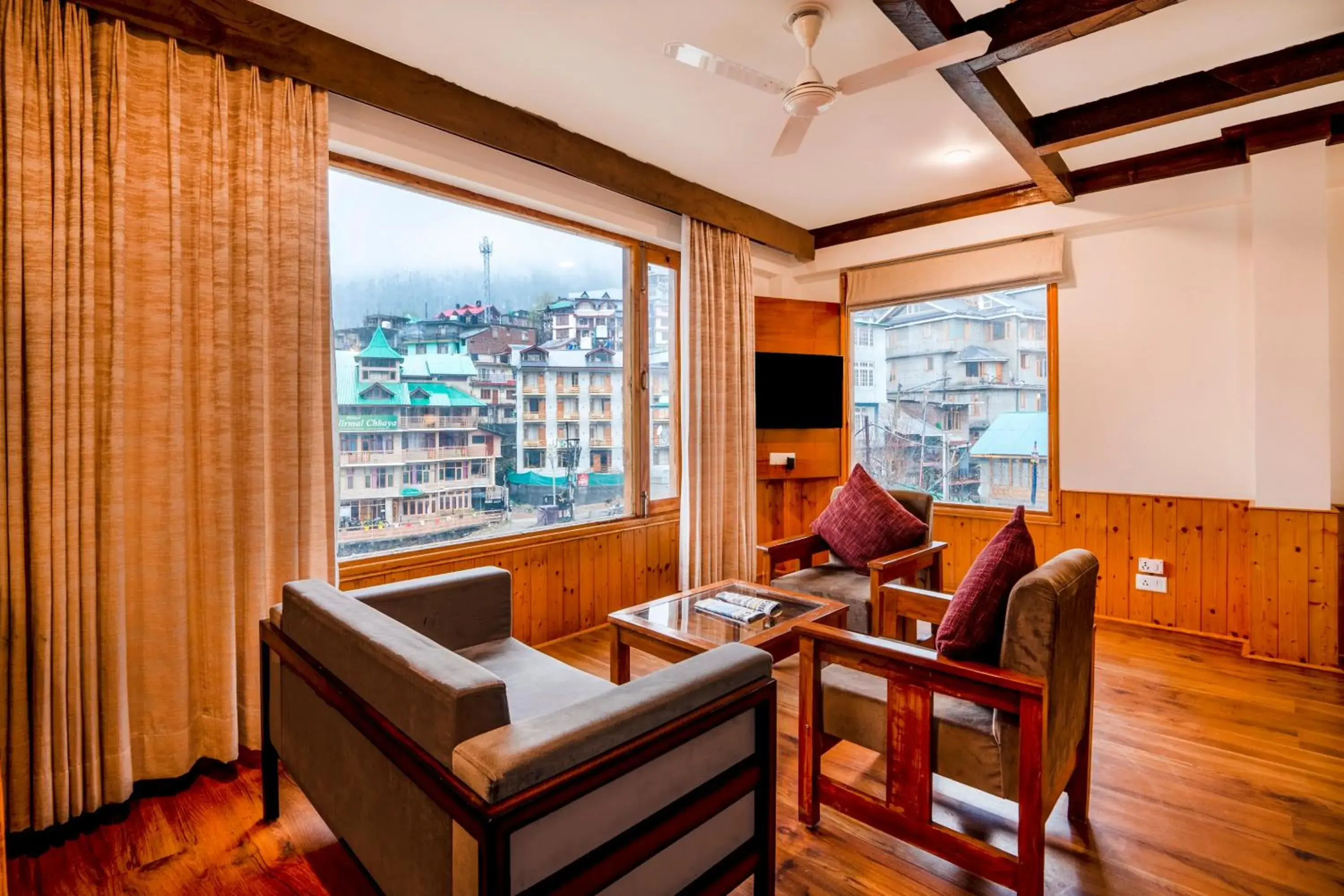 Seating area in Treebo Premium Sattva With Mountain View Seating area in Treebo Premium Sattva With Mountain View