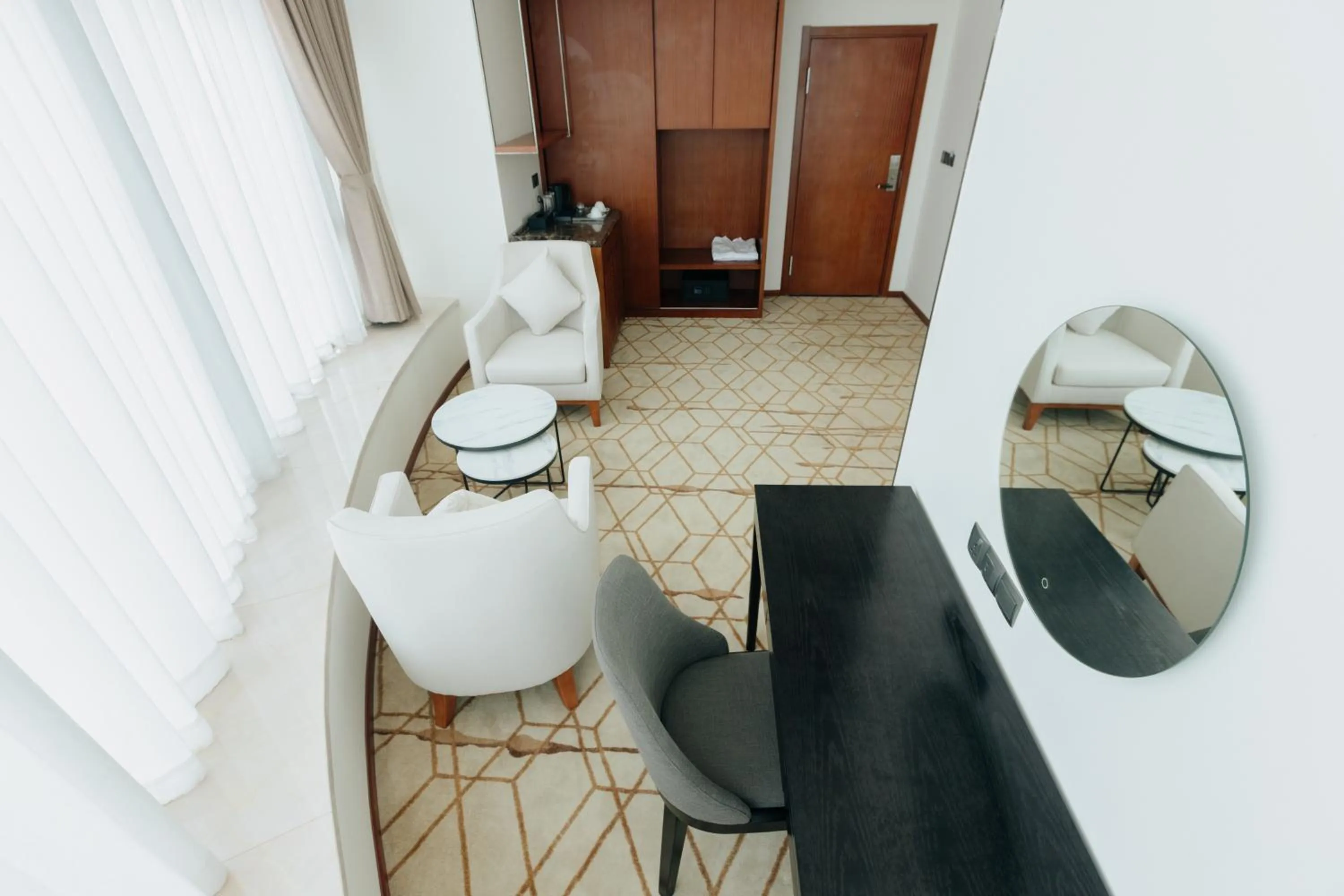 Seating area in Ease Hotel