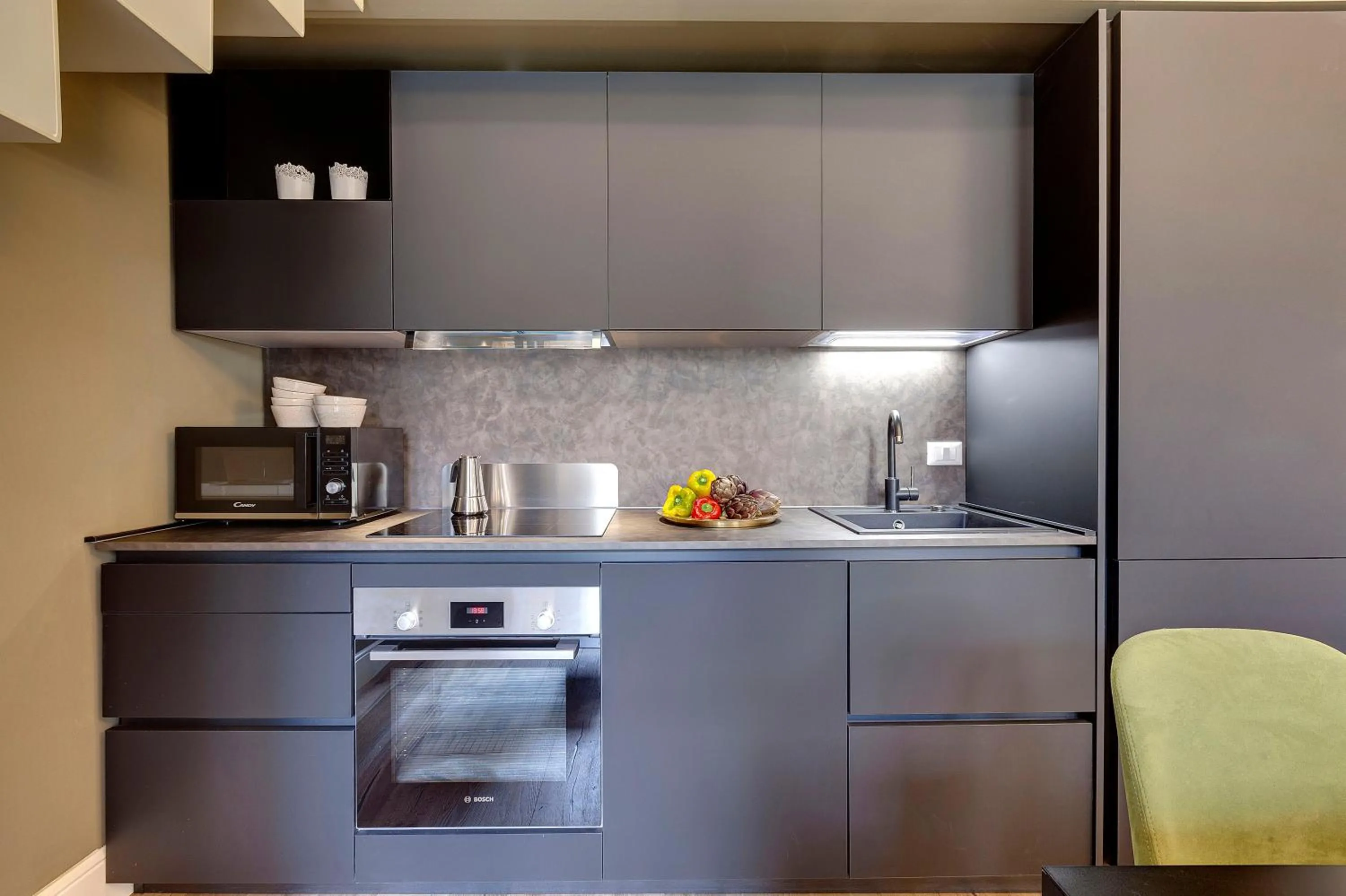Kitchen or kitchenette in Turandot Apartment by Mamo Florence