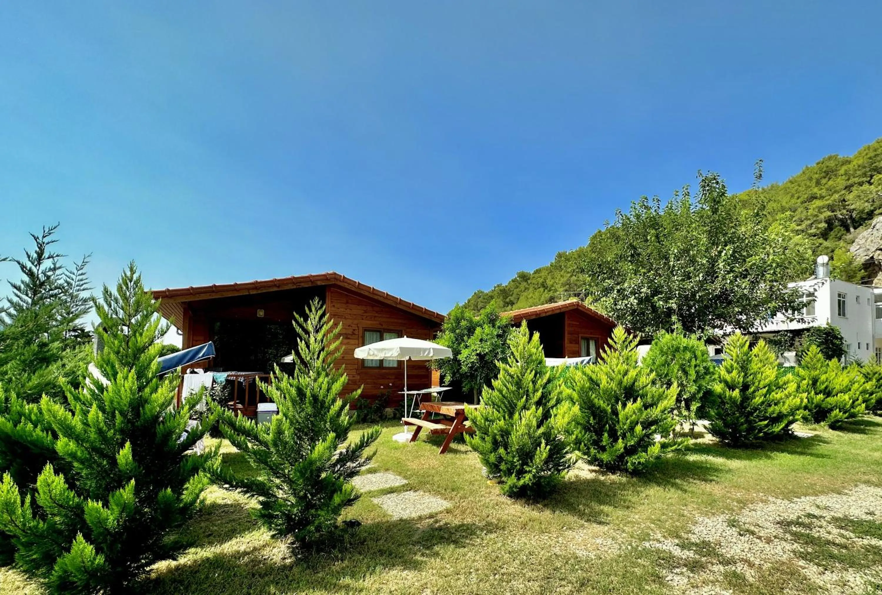 Property building in Hurmalik Aparts & Bungalows - Family Bungalows - Large Garden Bungalow with Barbecue