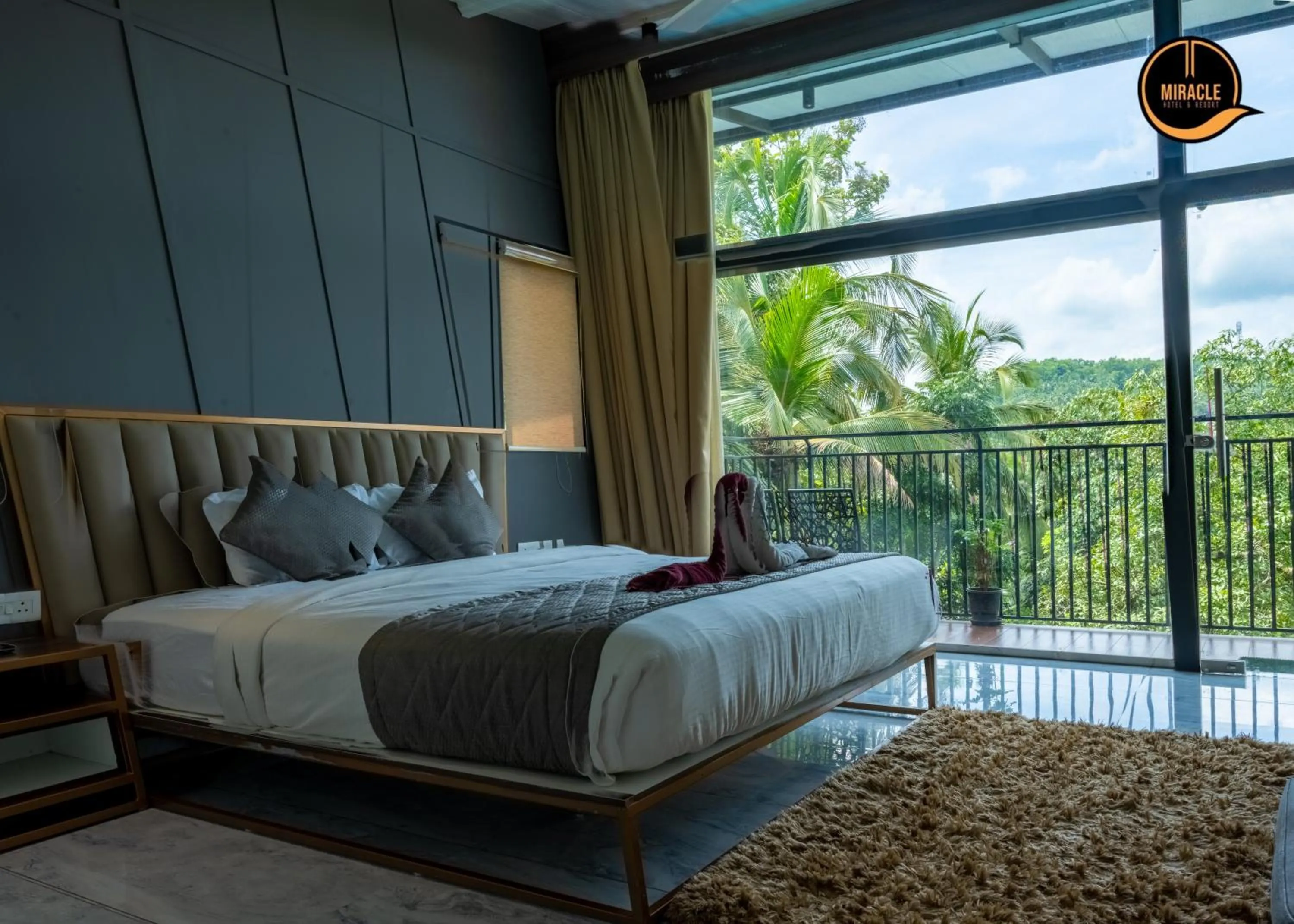 Bed in Miracle Hotel and Resorts