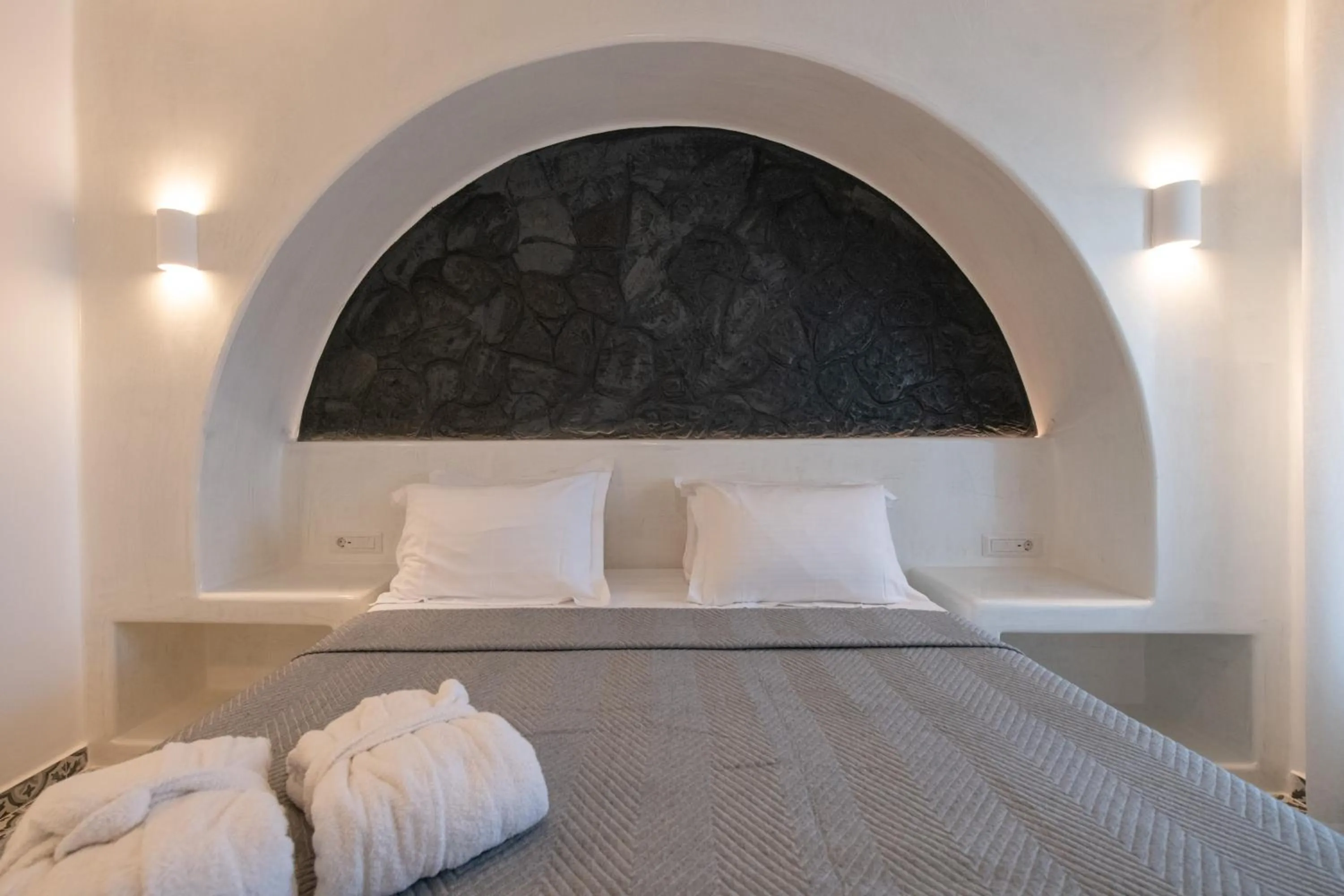 Bed in AVAL All Suite