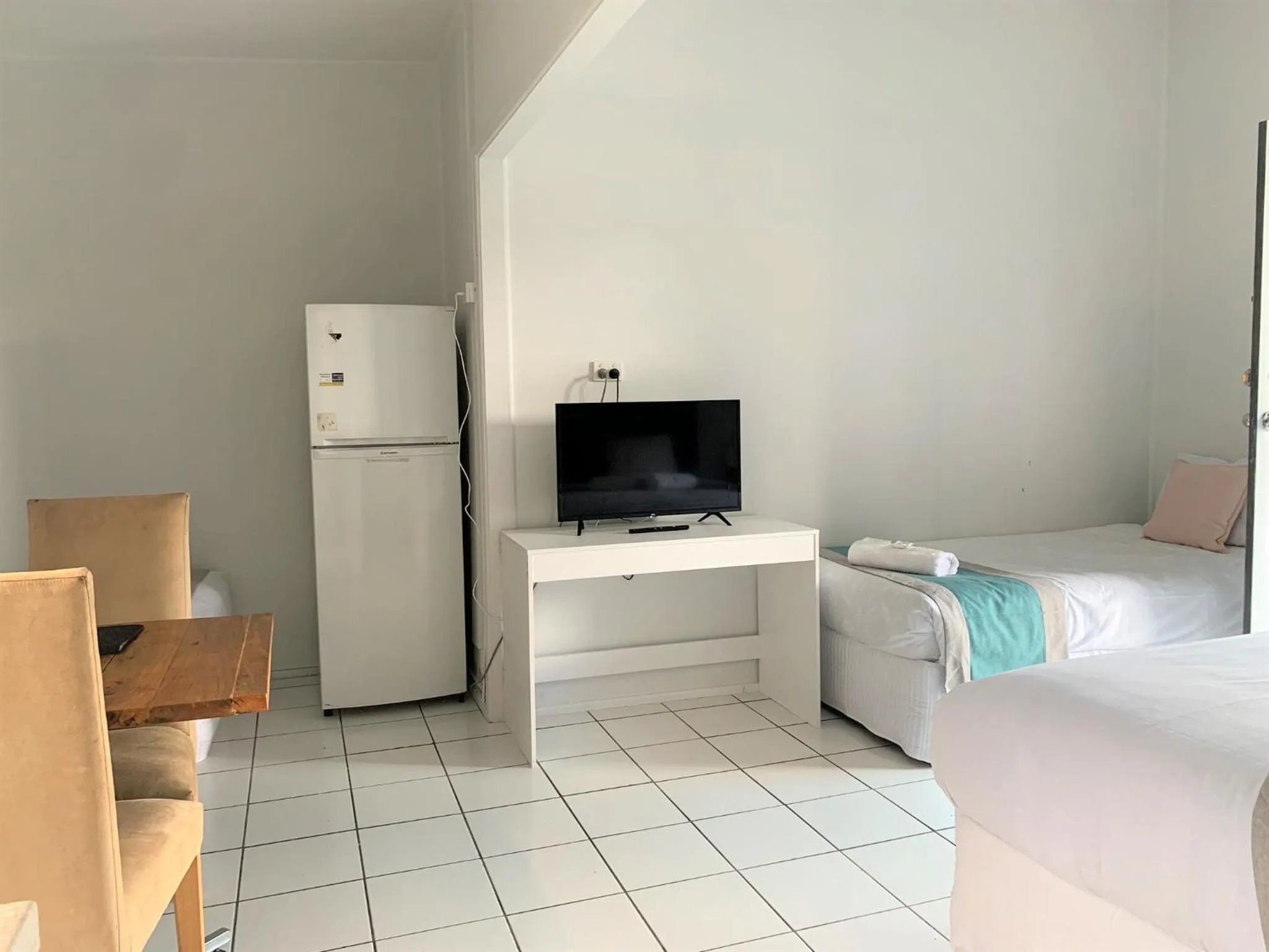 Bed in Aqua Blue Motel