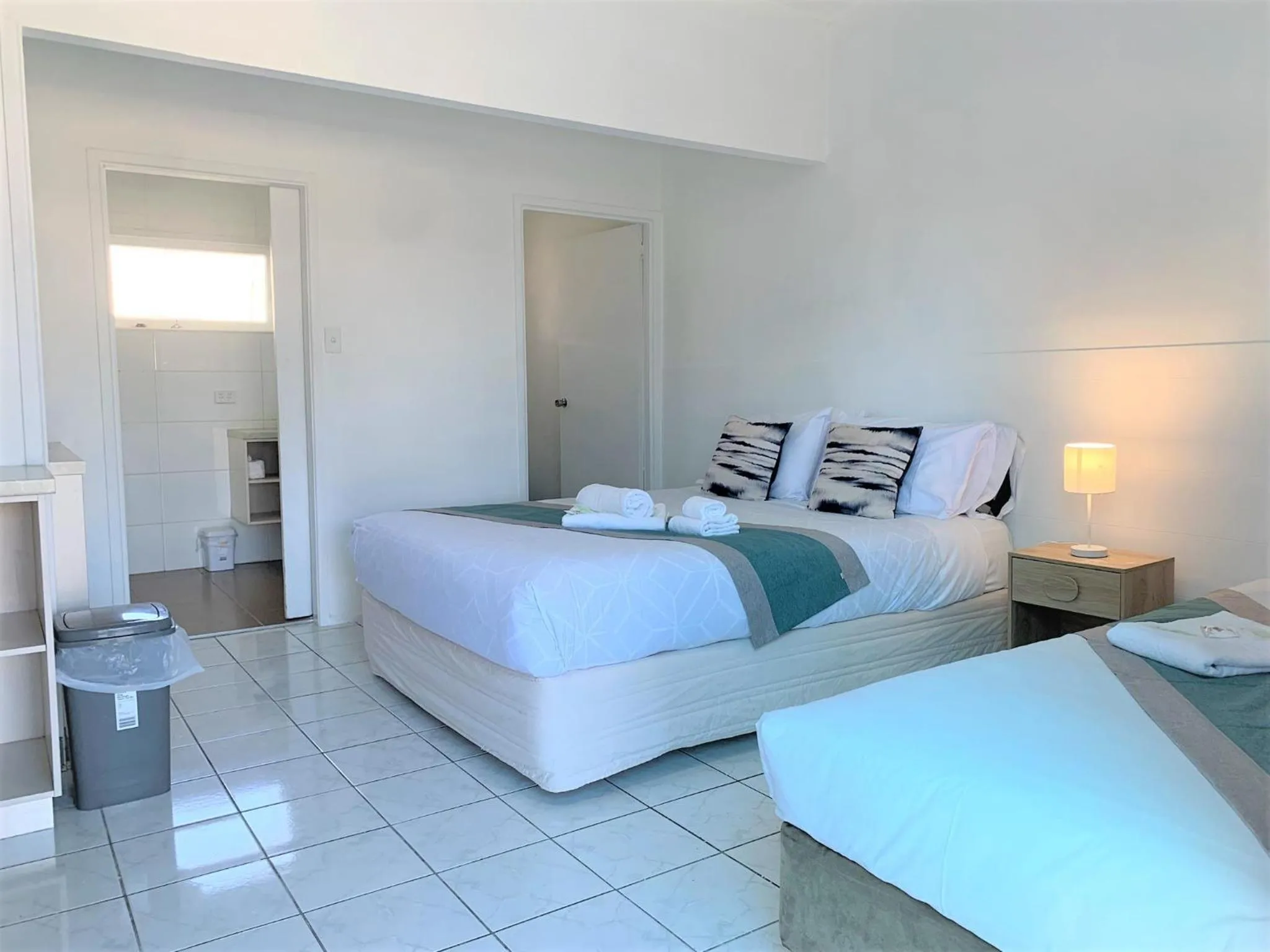 Bed in Aqua Blue Motel