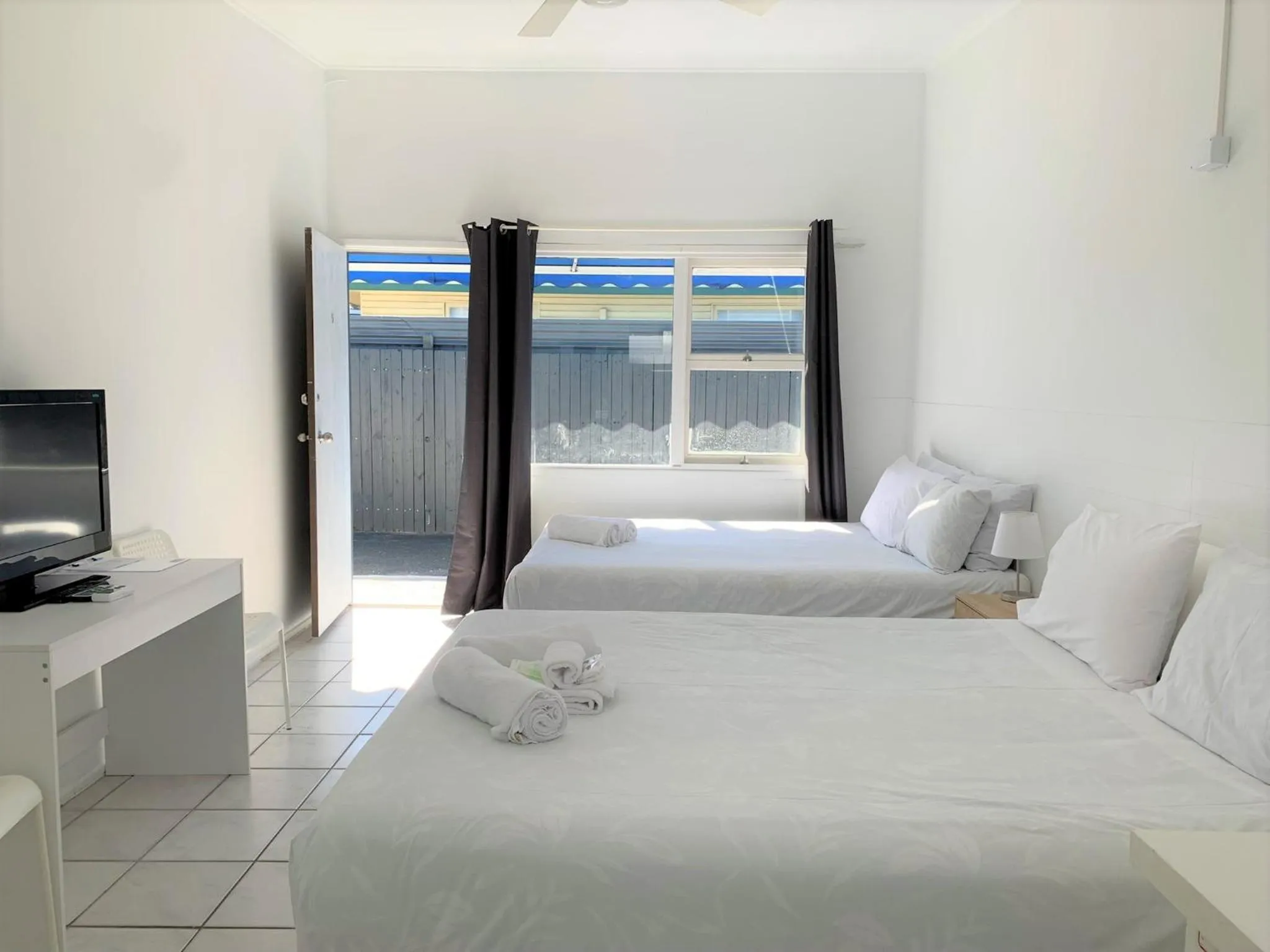 Bed in Aqua Blue Motel