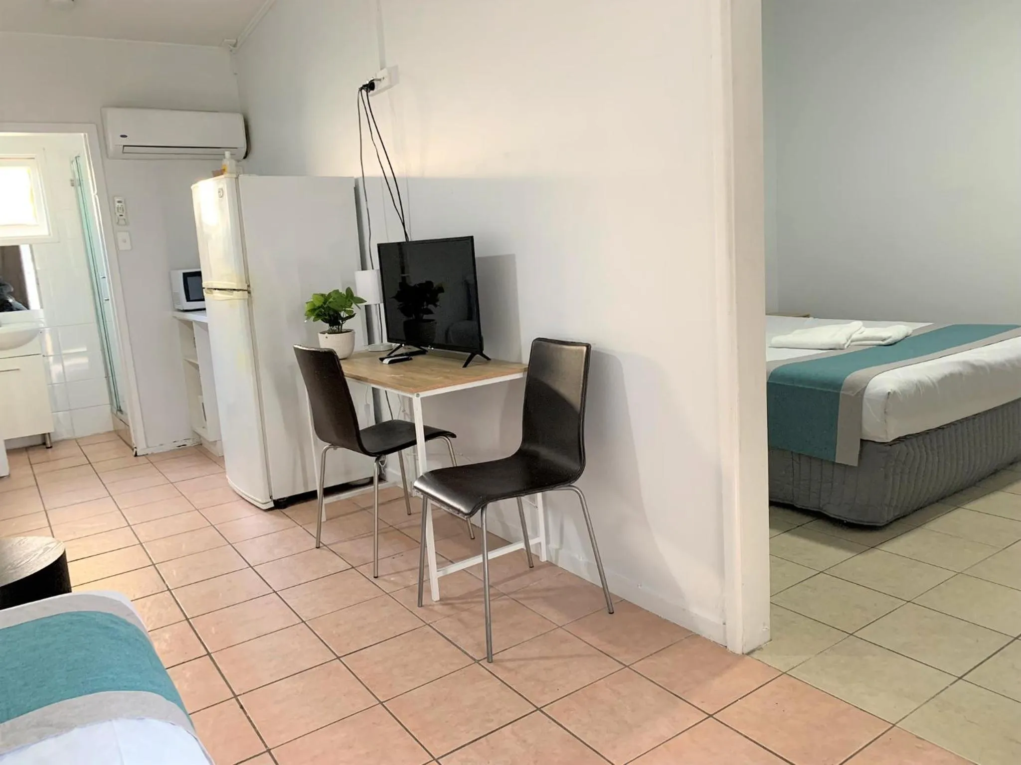 Bed in Aqua Blue Motel