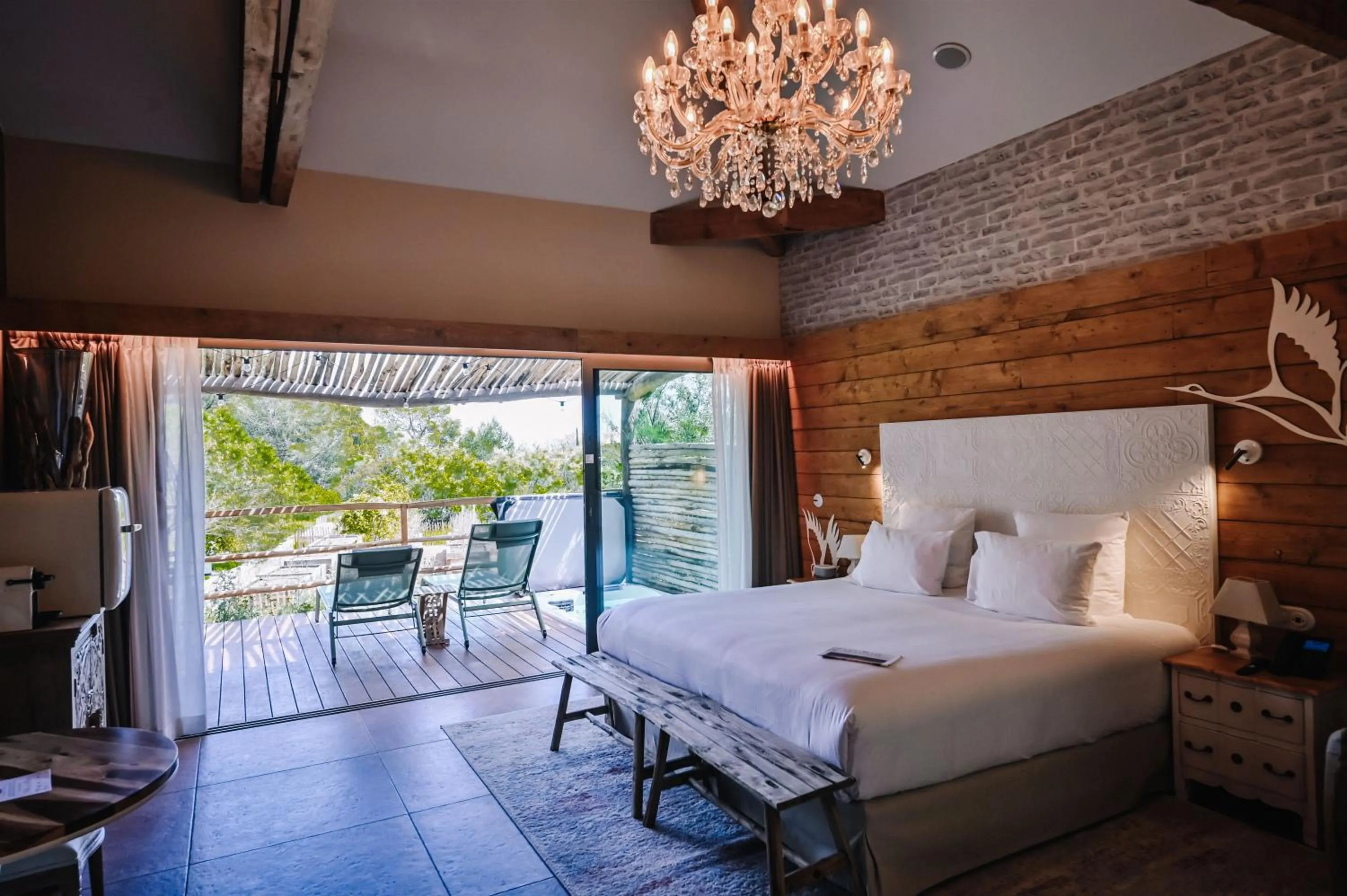 Bed in Le Hameau Des Pesquiers Ecolodge & Spa, Curio Collection By Hilton