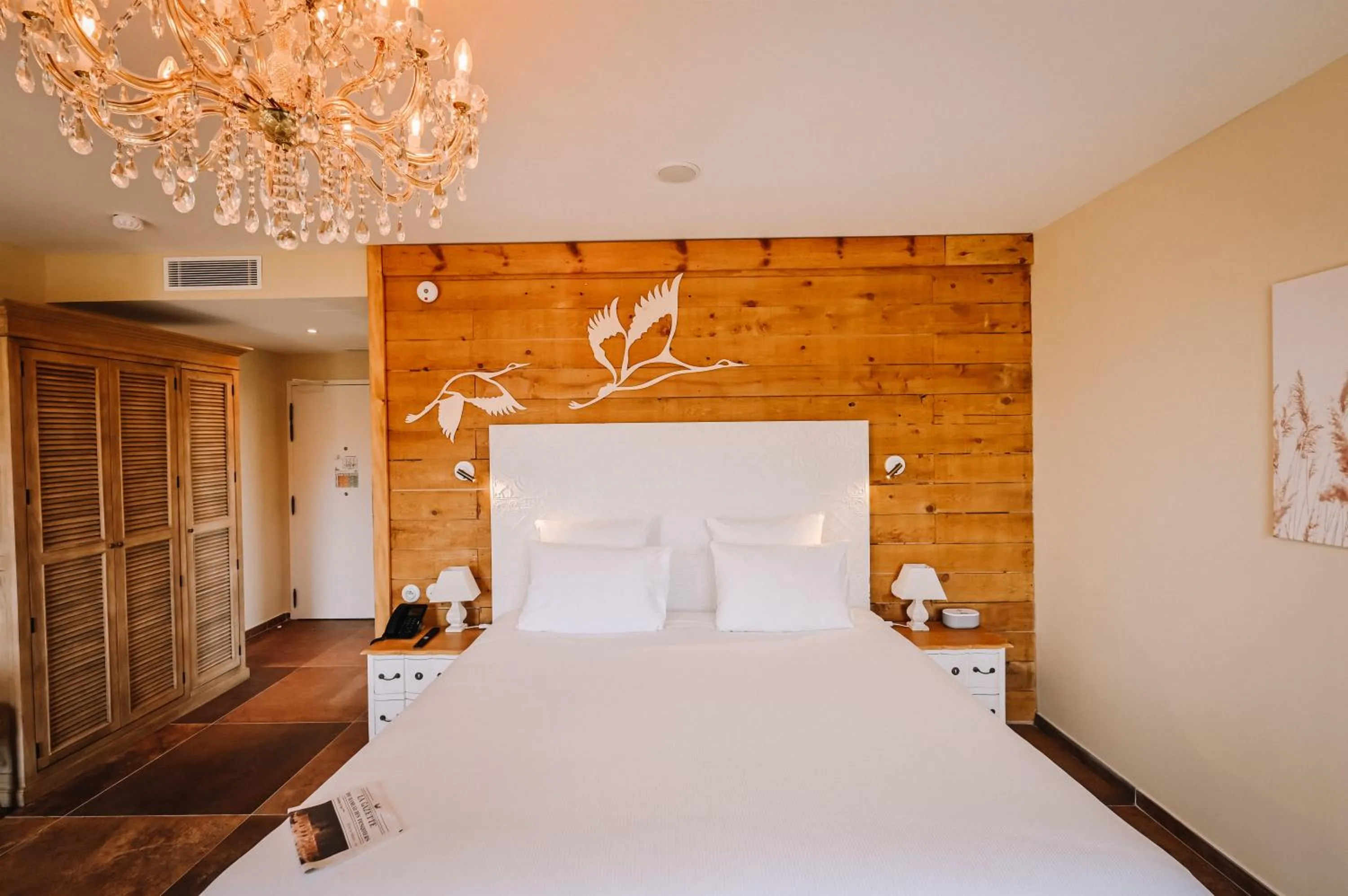 Photo of the whole room, Bed in Le Hameau Des Pesquiers Ecolodge & Spa, Curio Collection By Hilton