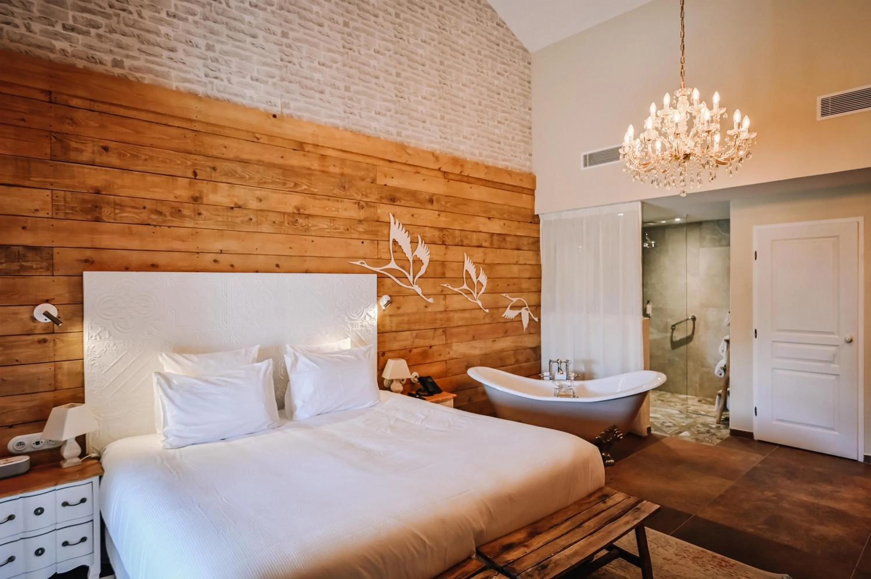 Photo of the whole room, Bed in Le Hameau Des Pesquiers Ecolodge & Spa, Curio Collection By Hilton