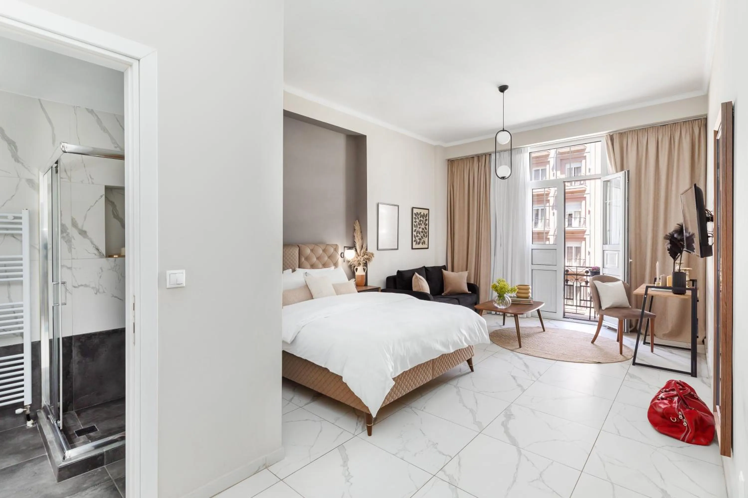 Photo of the whole room, Bed in Black Onyx Comfort Suites - Elegant Stay- City Center Next to Airport Bus