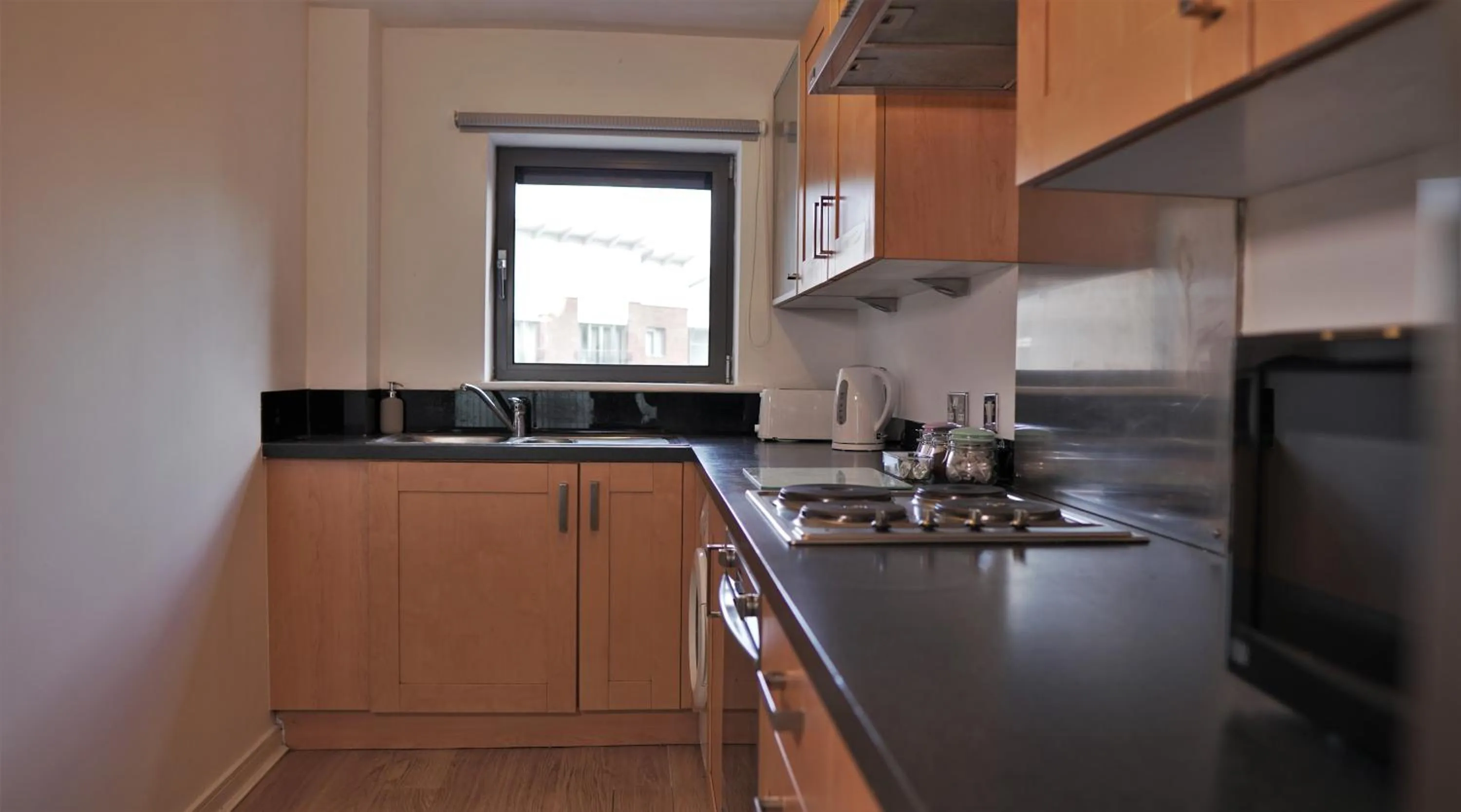 Kitchen or kitchenette in Albion Street Apartments