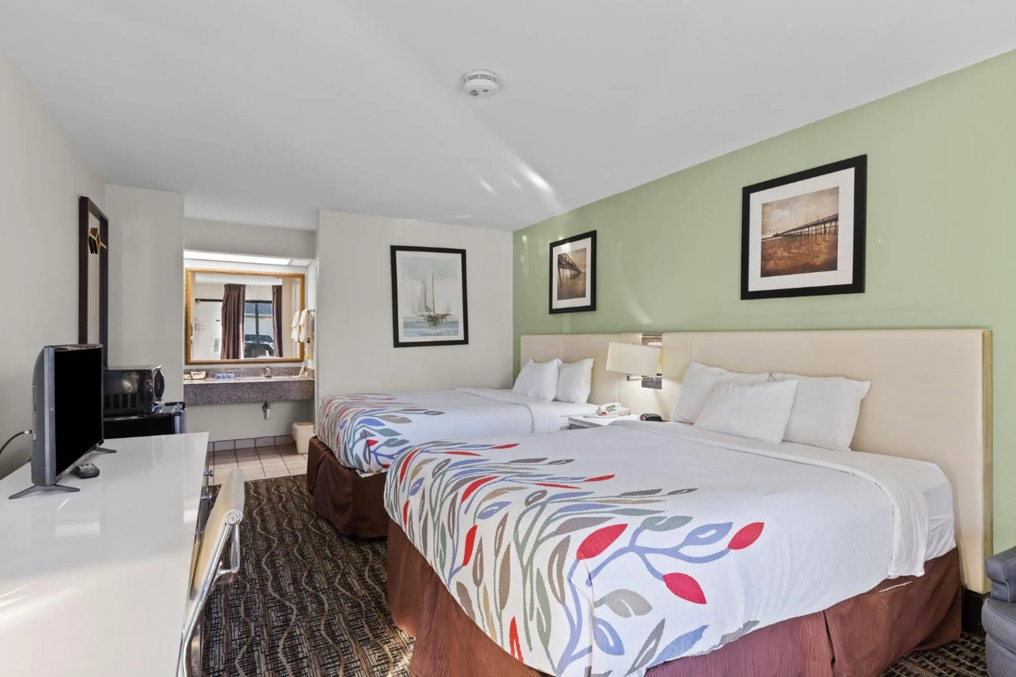 Bed in Garnet Inn & Suites, Morehead City near Atlantic Beach