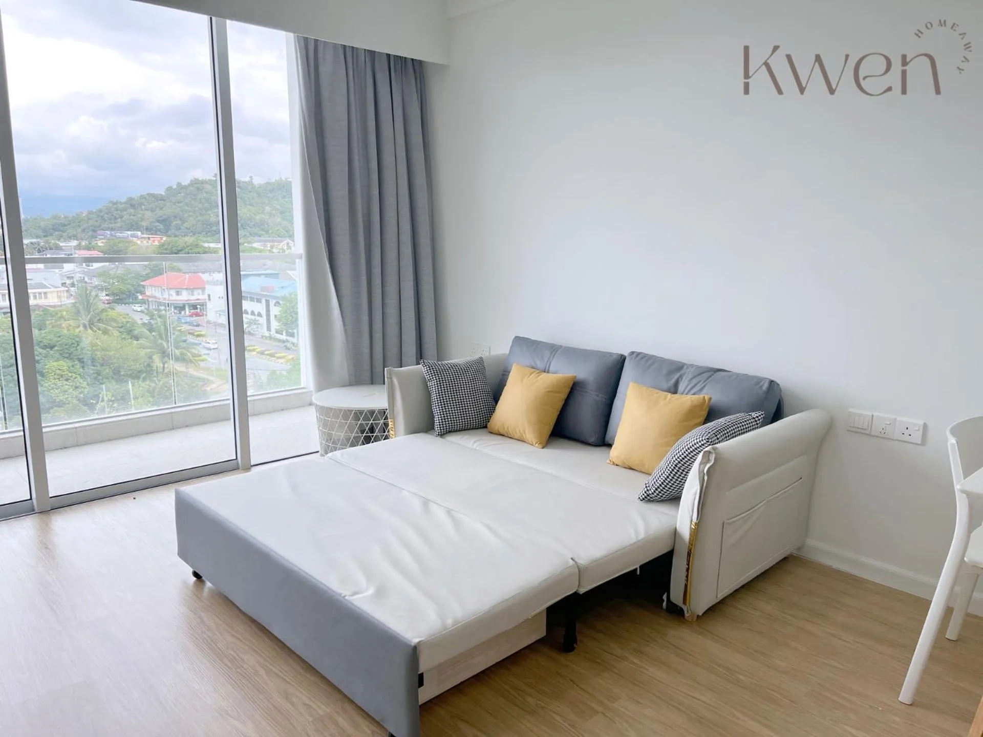 Living room, Bed in KWEN Suites-Tanjung Aru InfinityPool Seaview/Airport View