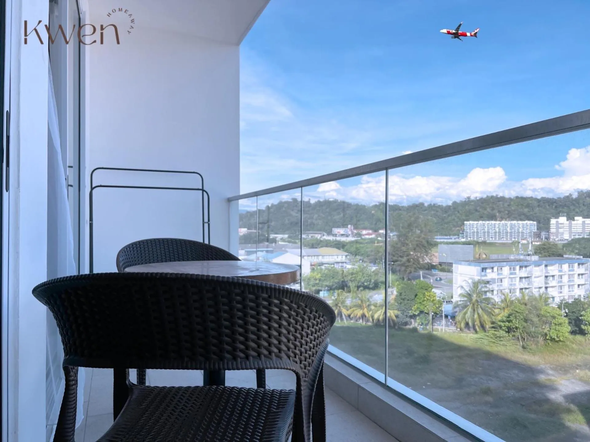 Balcony/Terrace in KWEN Suites-Tanjung Aru InfinityPool Seaview/Airport View