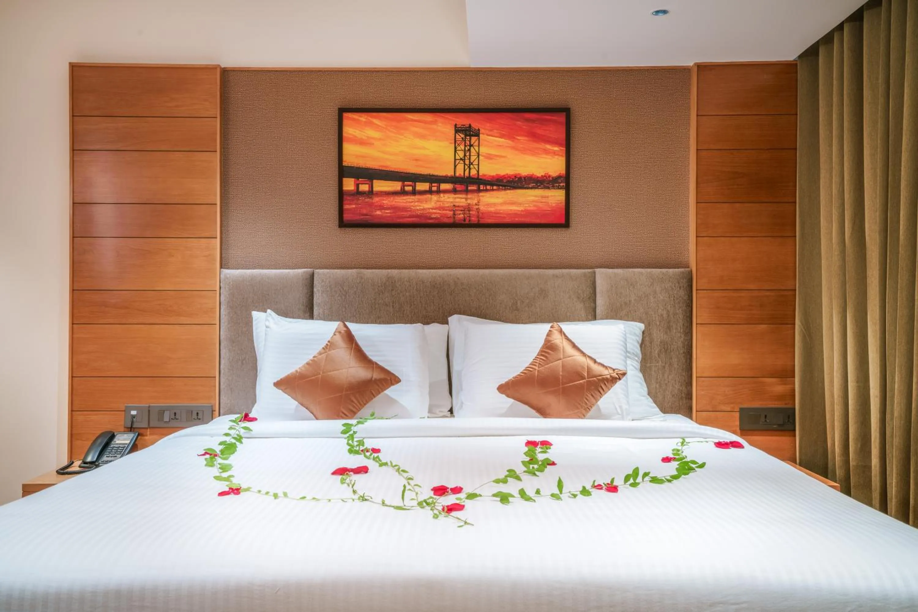 Bed in Townbridge Hotels & Suites