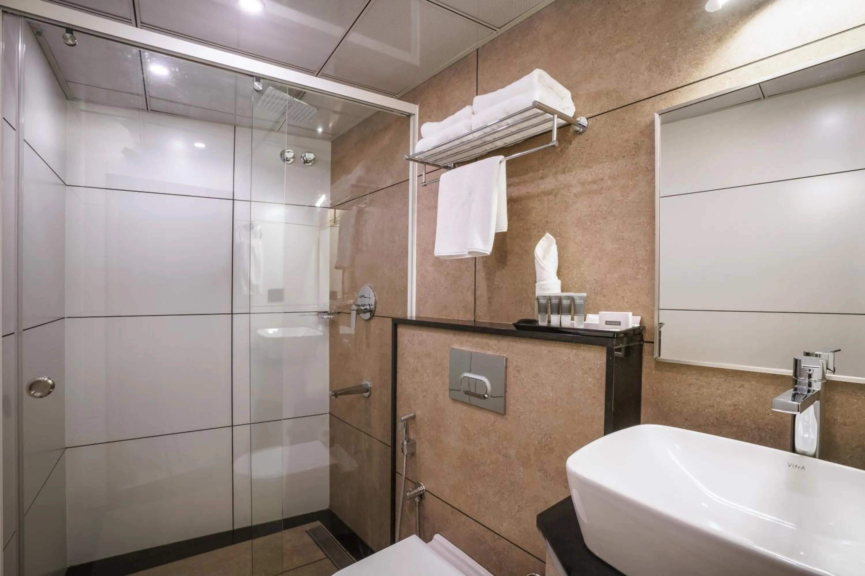 Shower in Townbridge Hotels & Suites