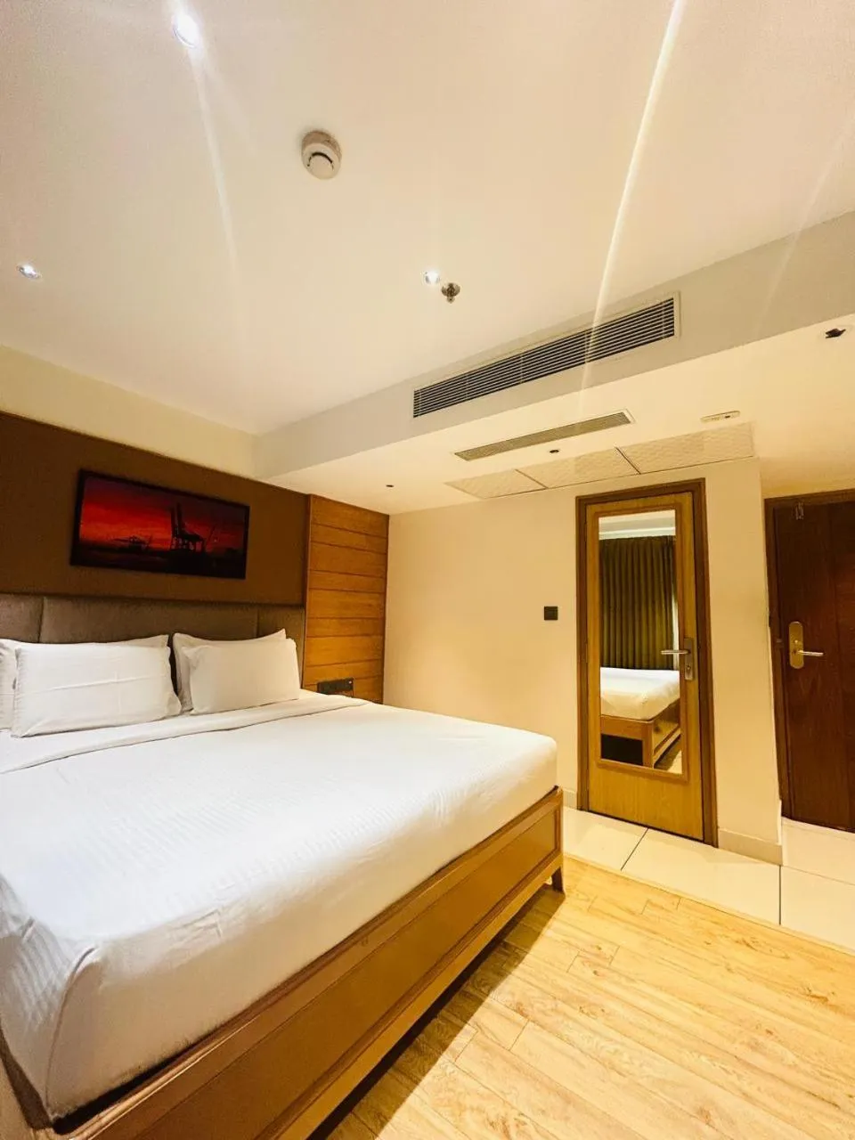 Bed in Townbridge Hotels & Suites