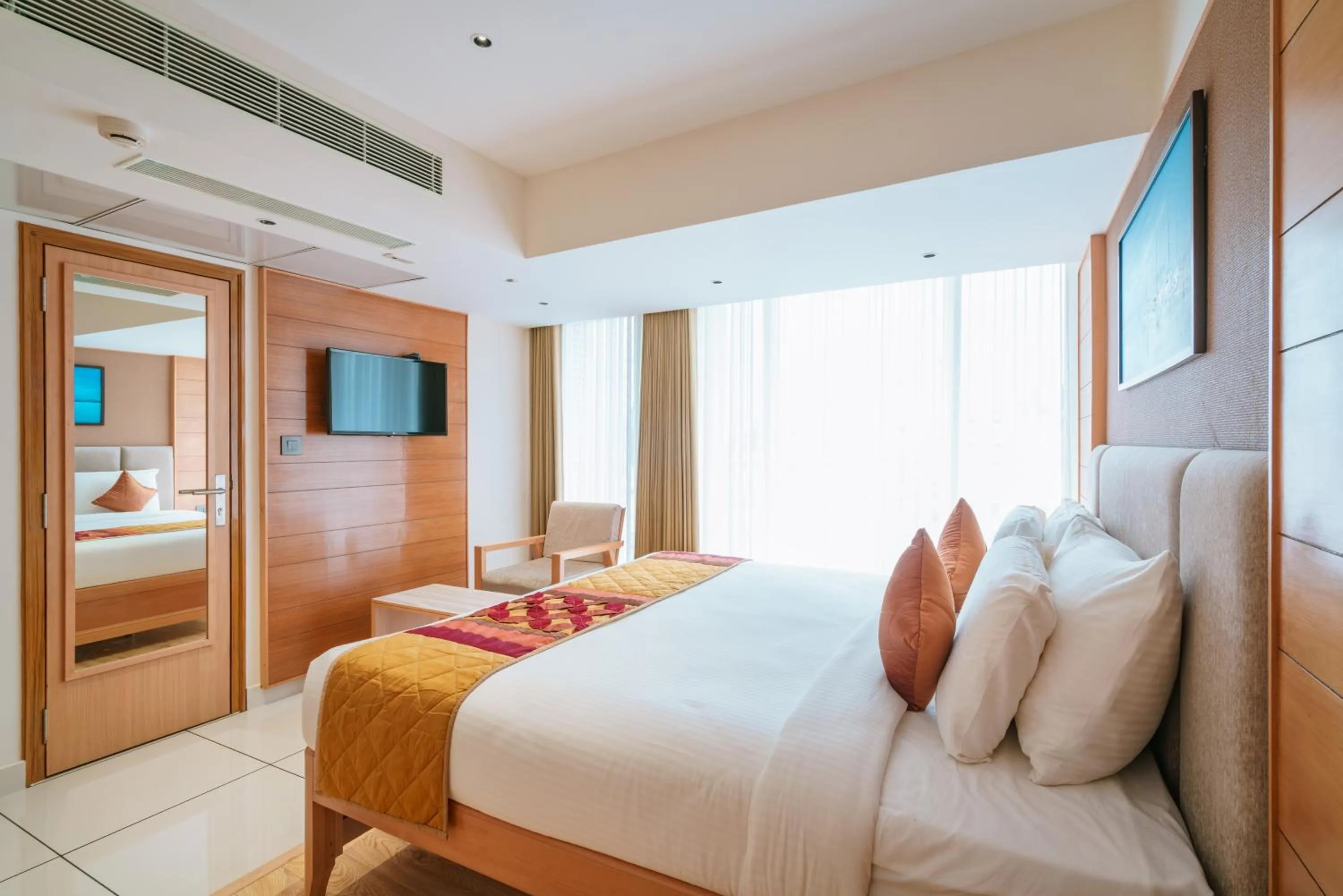 Bed in Townbridge Hotels & Suites