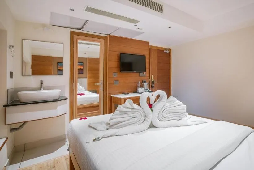 Bed in Townbridge Hotels & Suites