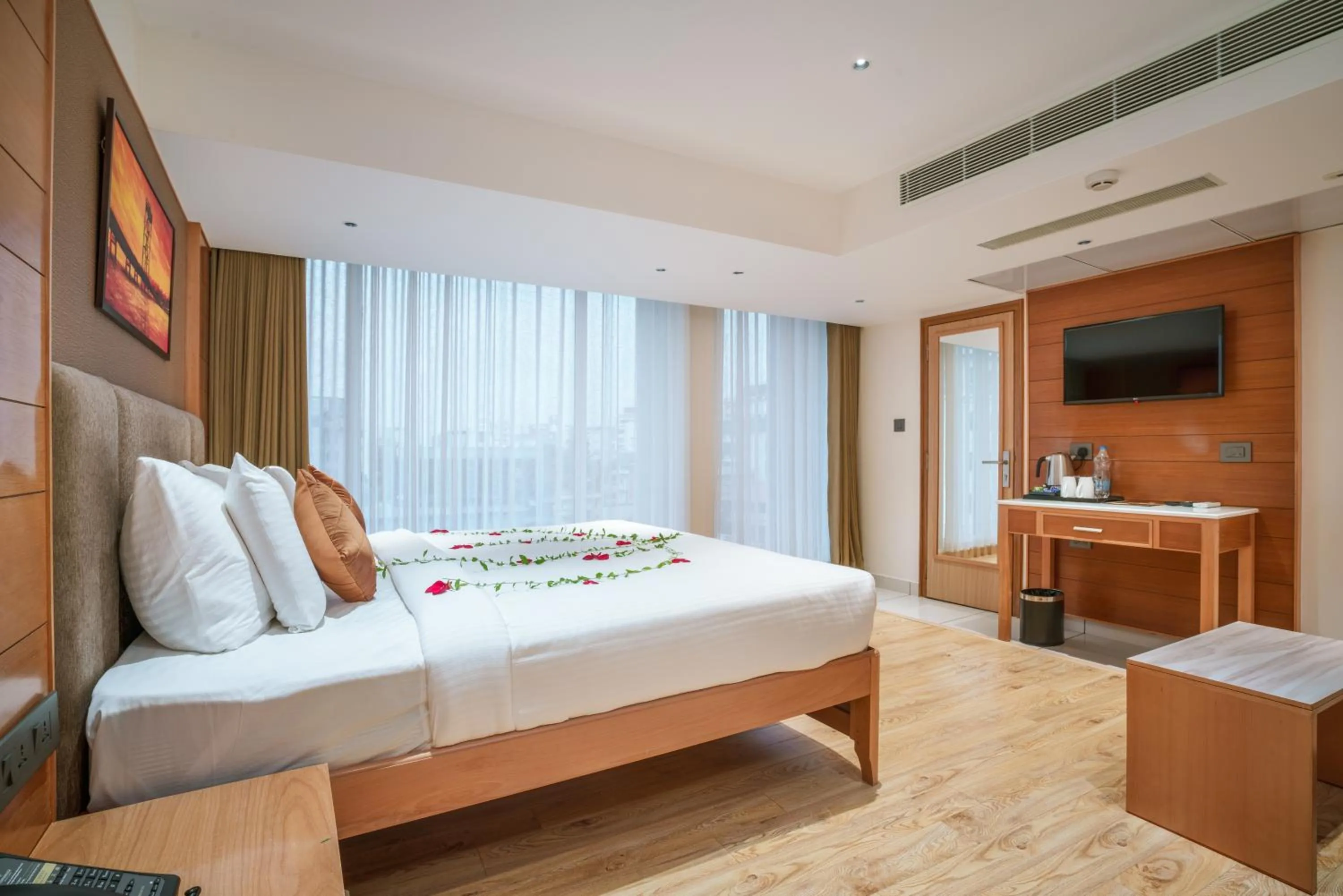 Bed in Townbridge Hotels & Suites