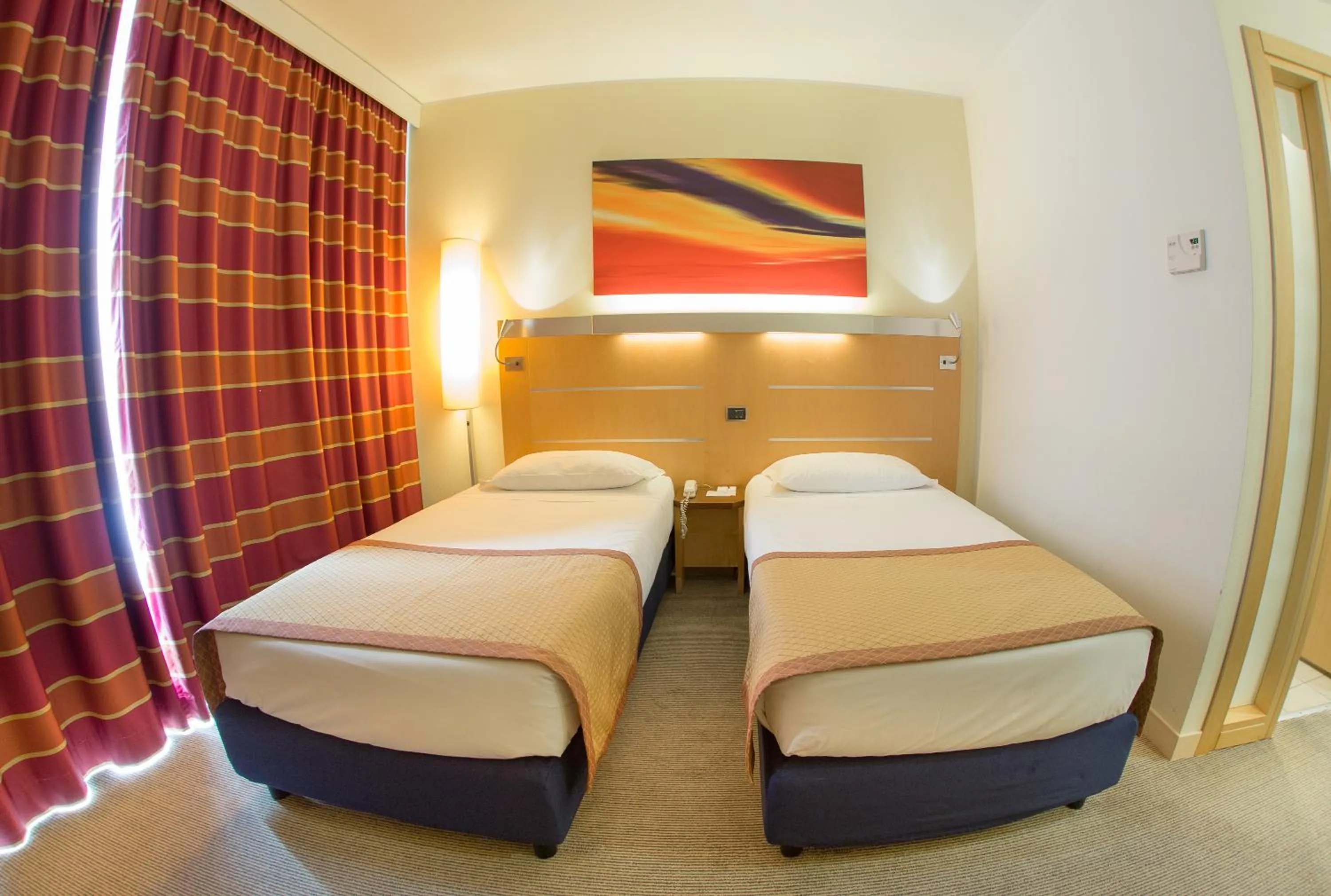 Bed in UNA HOTELS Cesena Nord