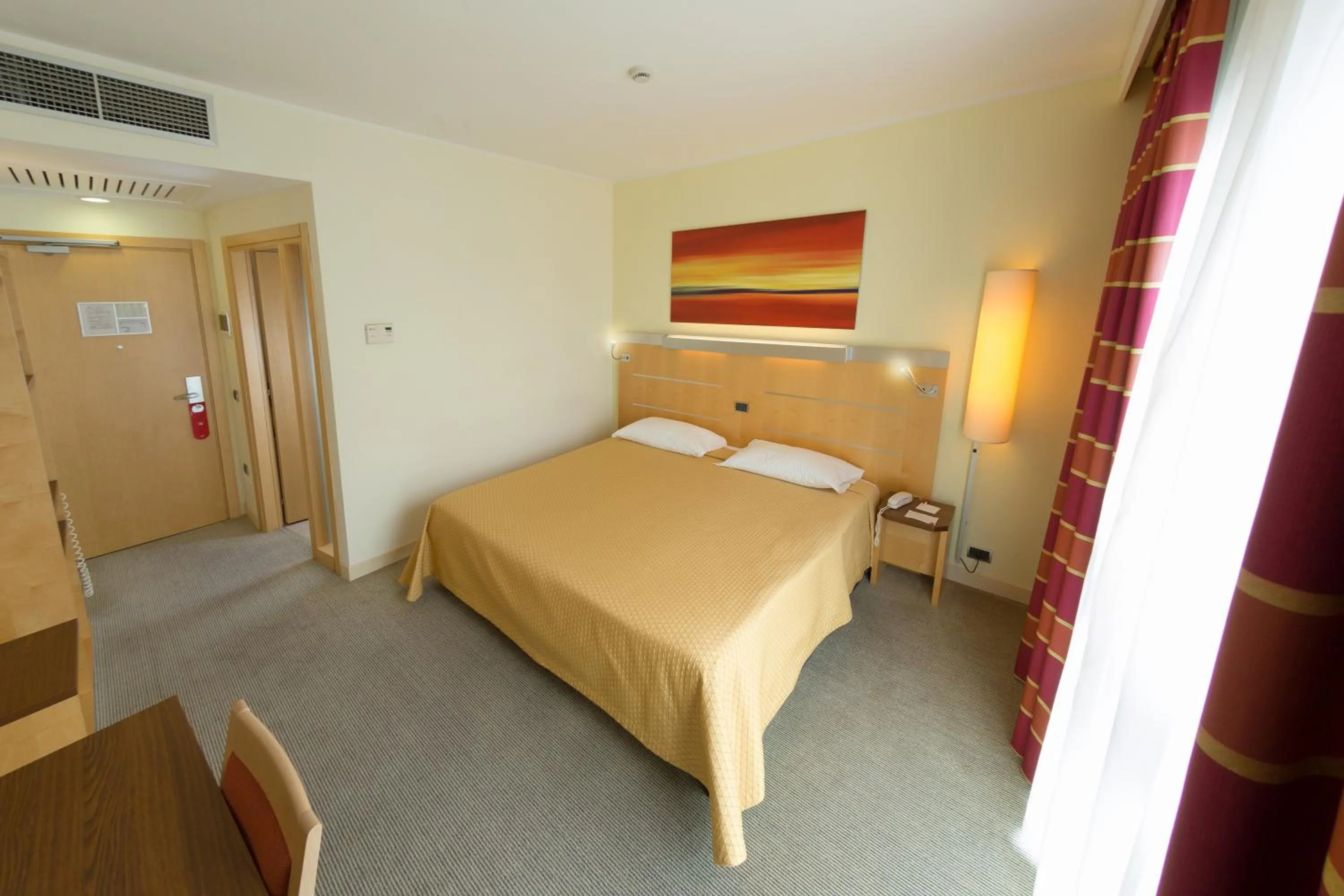 Bed in UNA HOTELS Cesena Nord