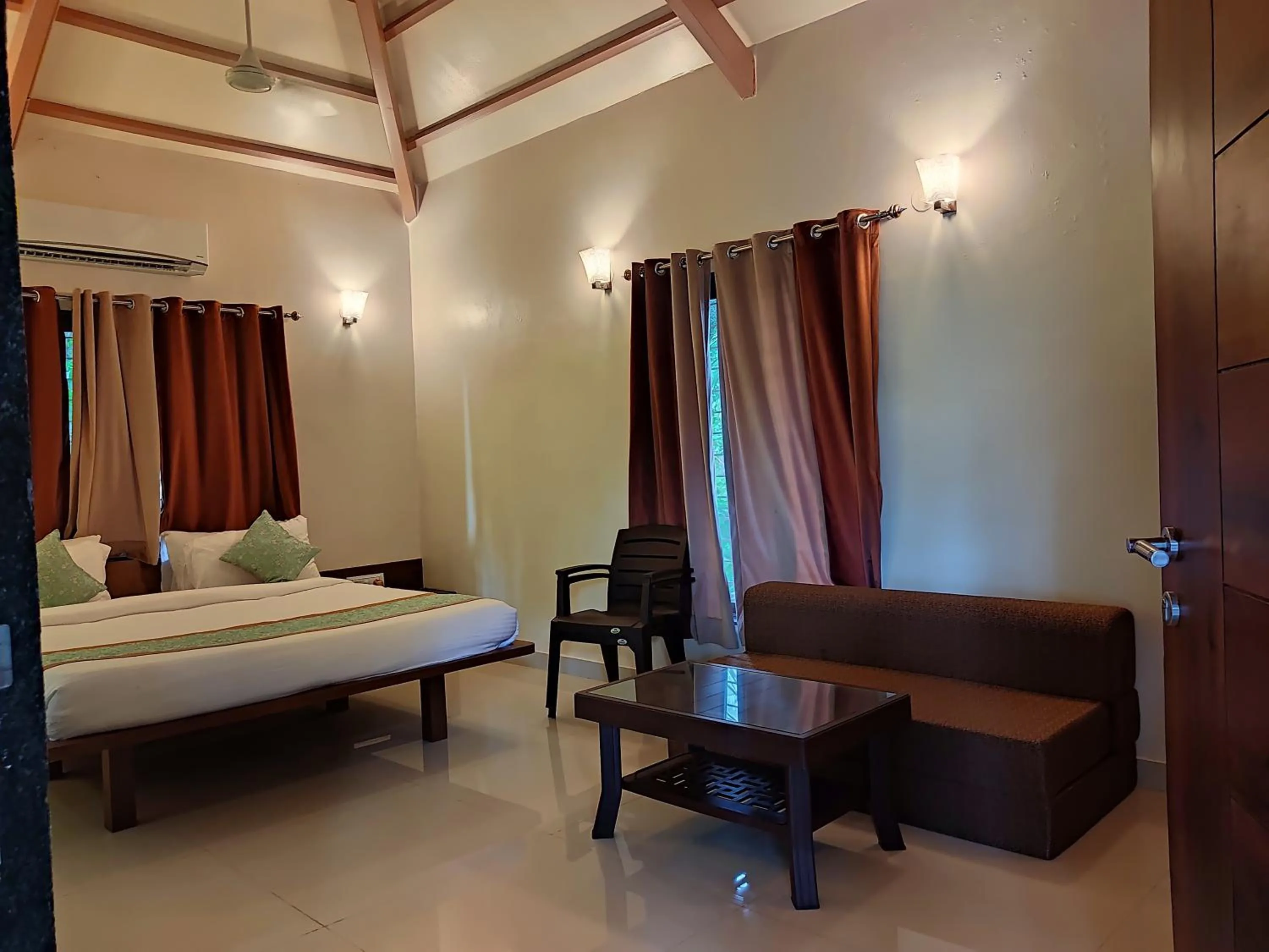 Seating area, Bed in Cocorico Beach Resort