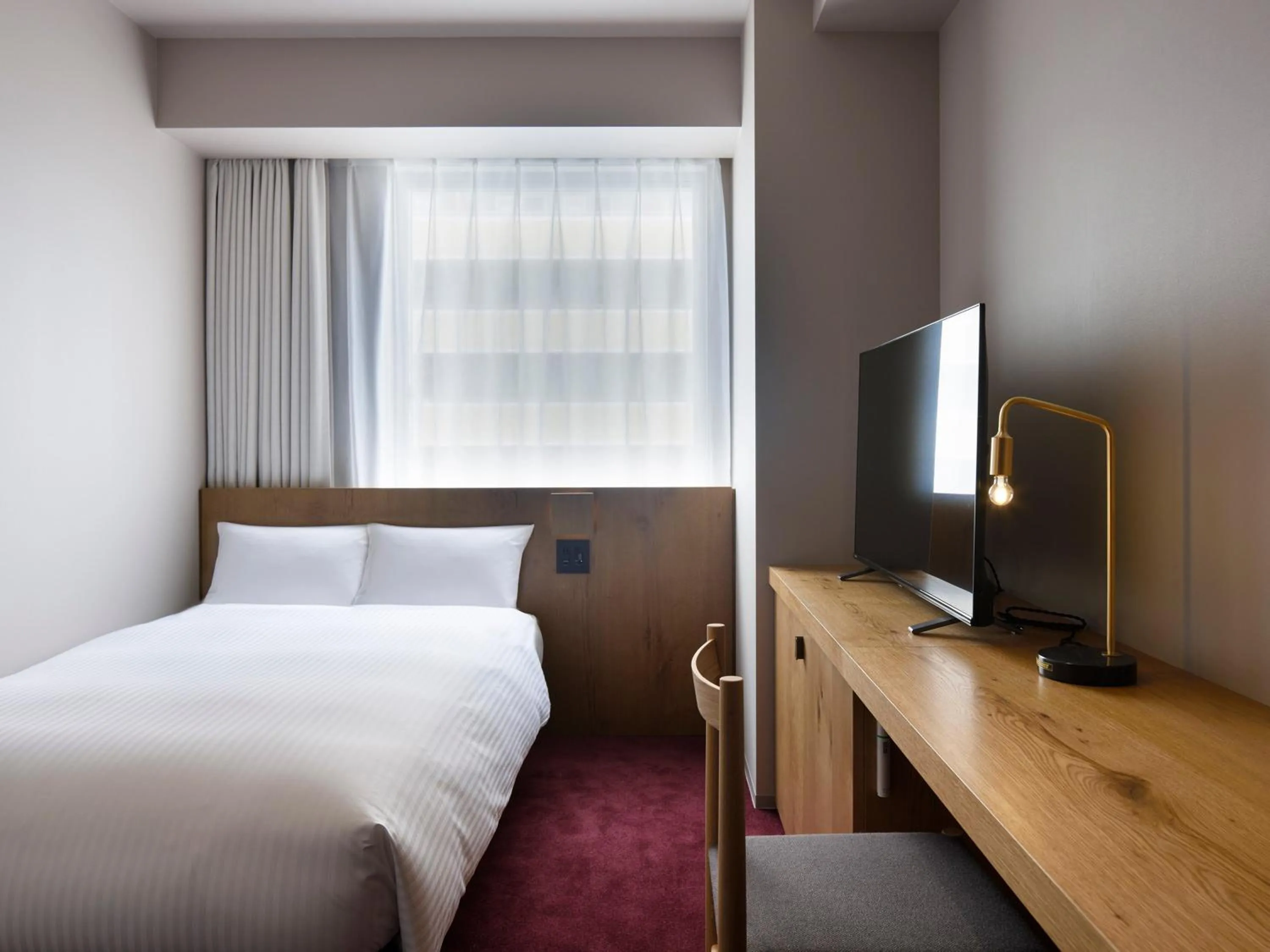 Photo of the whole room, Bed in hotel androoms Sapporo Susukino