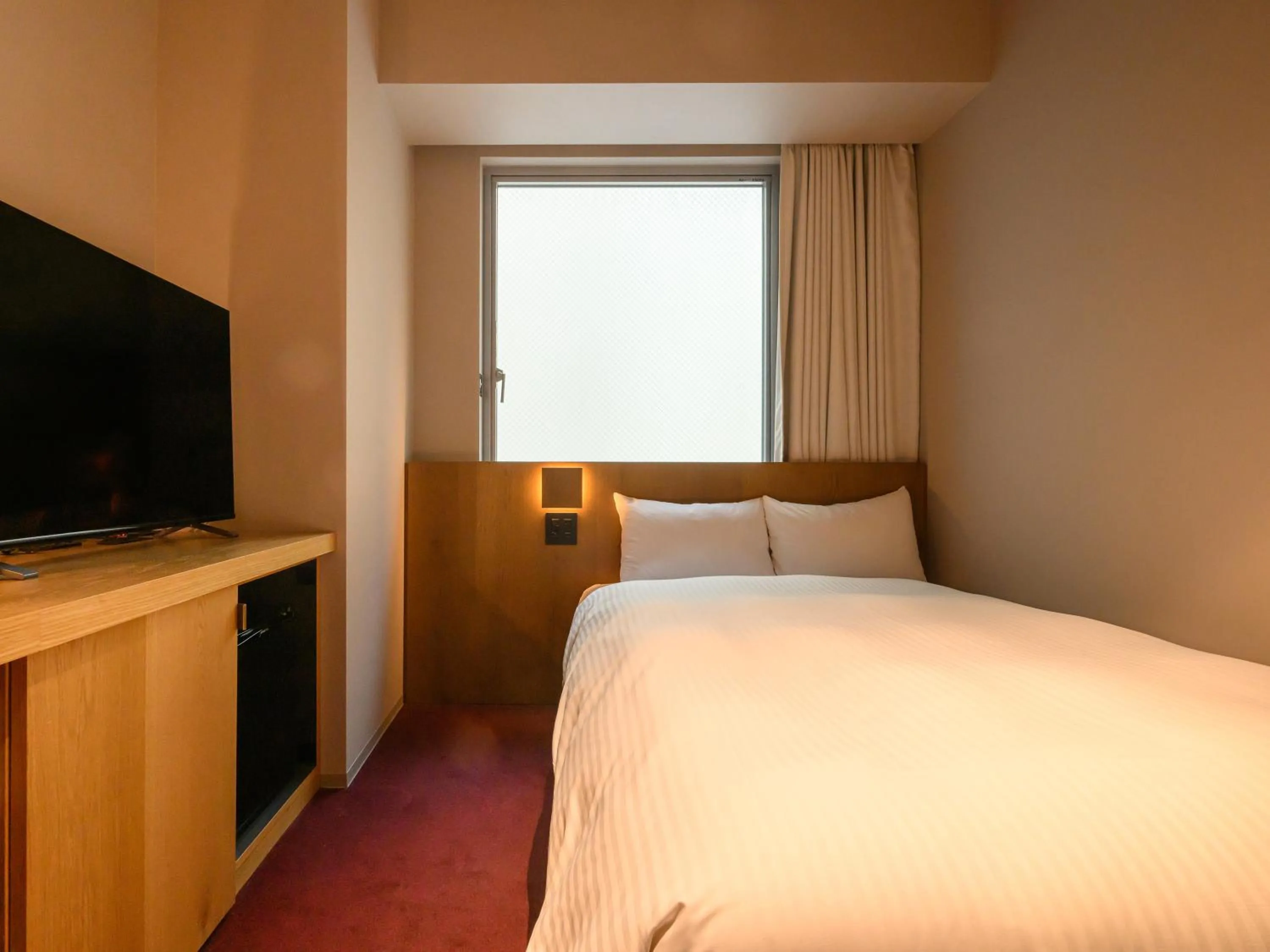 Photo of the whole room, Bed in hotel androoms Sapporo Susukino