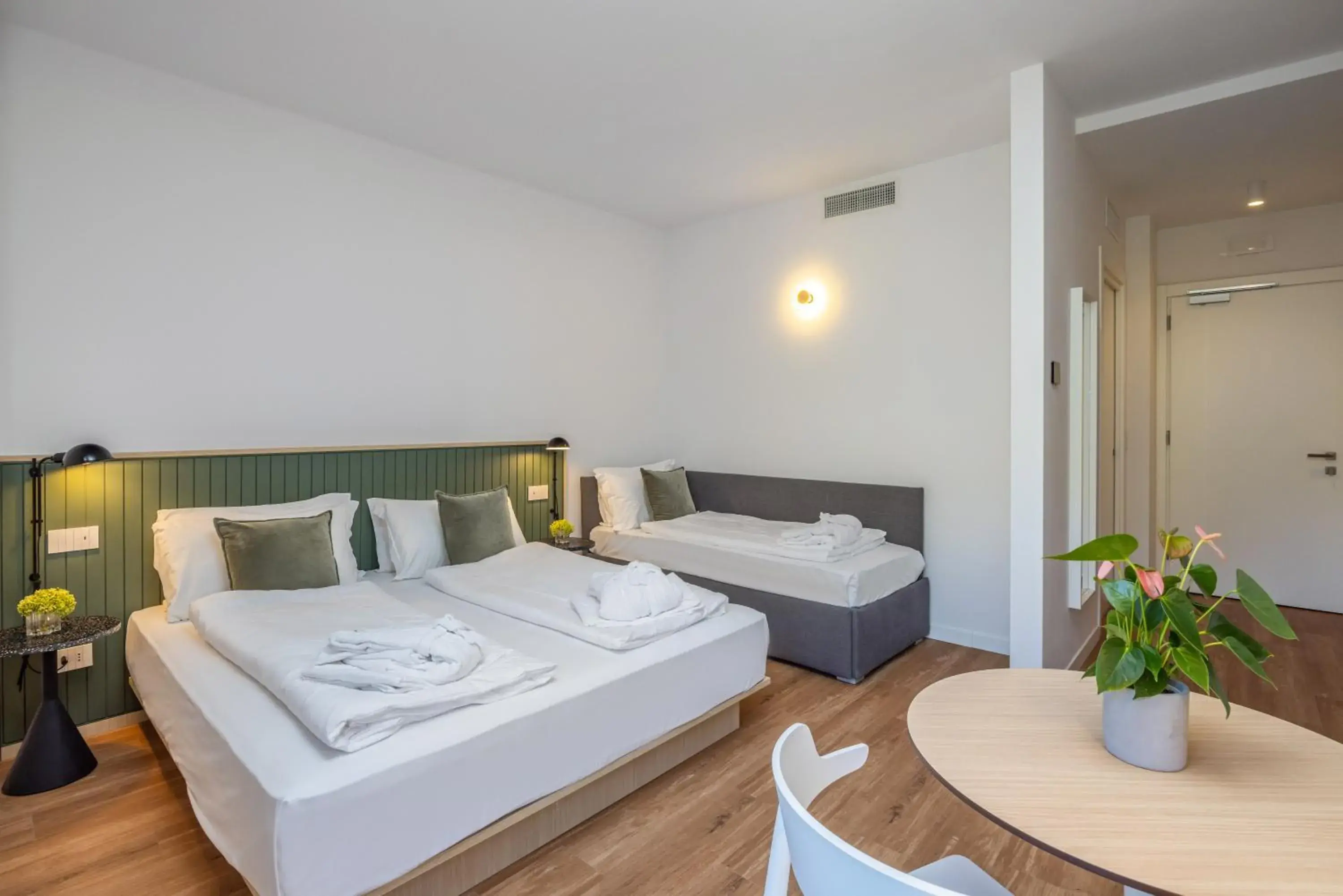 Triple Room in Hotel Al Sorriso Greenpark & Wellness Triple Room in Hotel Al Sorriso Greenpark & Wellness