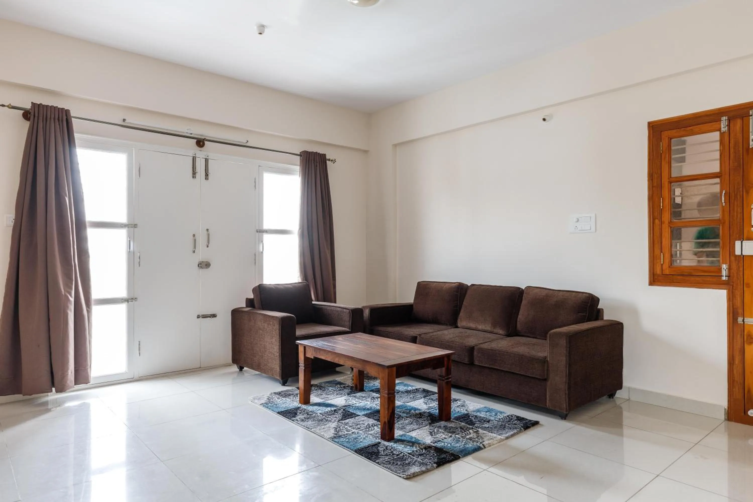 Living room in Pinnacle Serviced Apartments