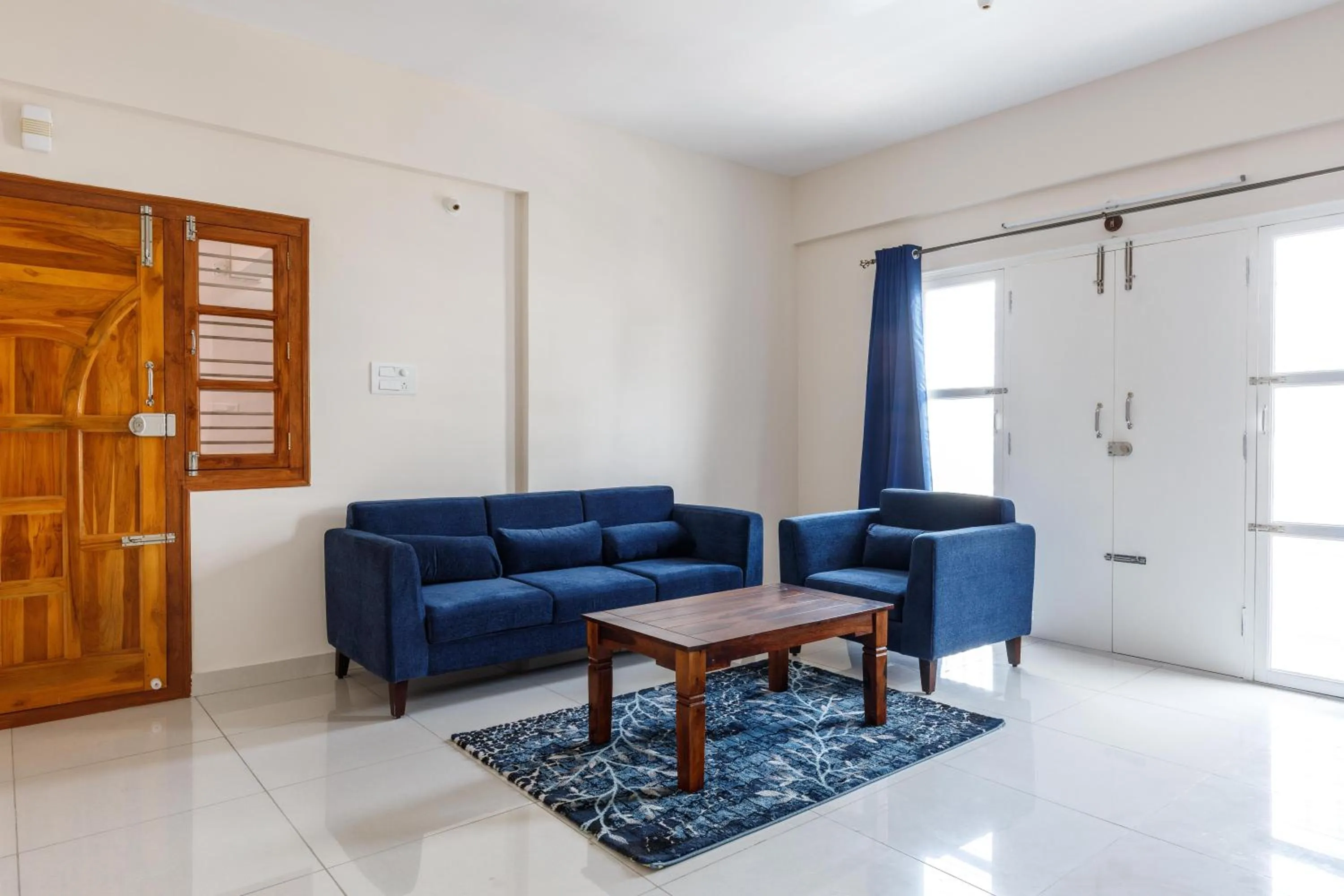 Living room in Pinnacle Serviced Apartments