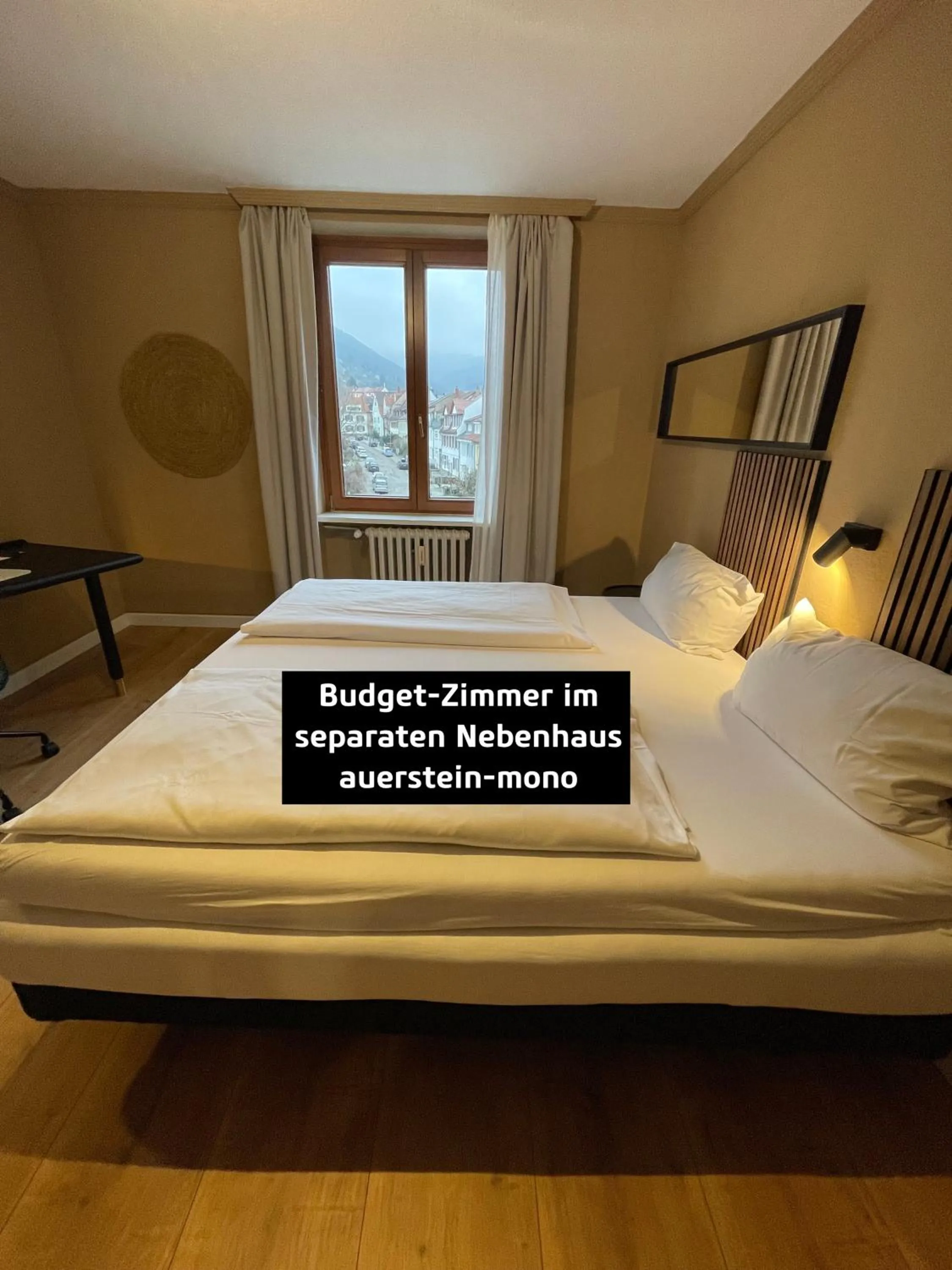 Bed in AUERSTEIN-Hotels auerstein & auerstein-mono