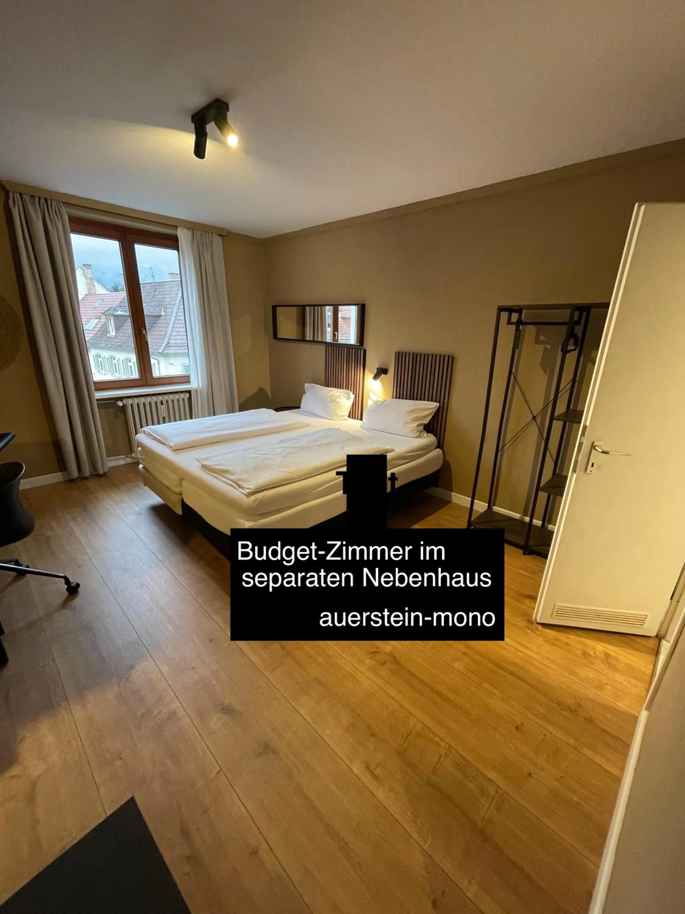 Living room, Bed in AUERSTEIN-Hotels auerstein & auerstein-mono