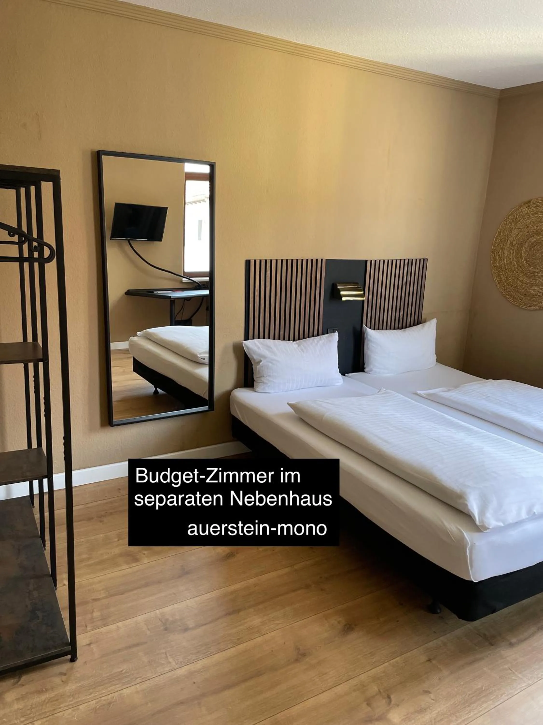 Living room, Bed in AUERSTEIN-Hotels auerstein & auerstein-mono