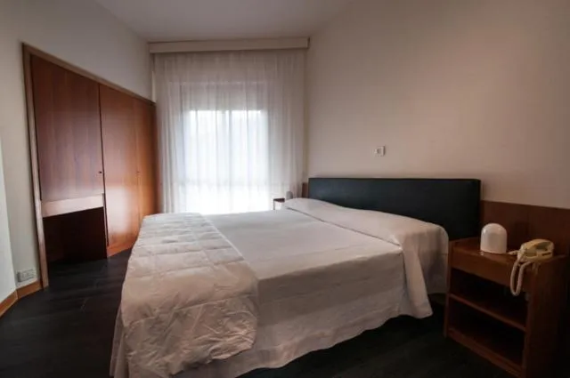 Bed in Hotel Michelangelo & Day SPA