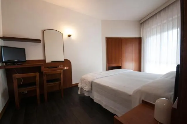 Bed in Hotel Michelangelo & Day SPA