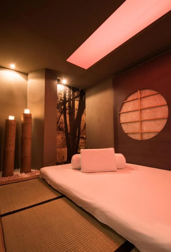 Bed in Hotel Michelangelo & Day SPA