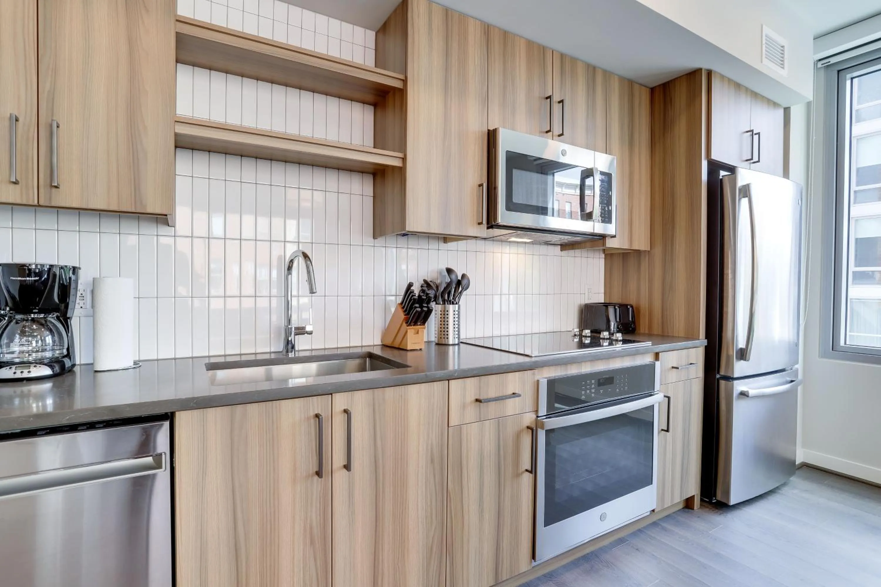 kitchen in Stylish Condo at Clarendon with Rooftop Views