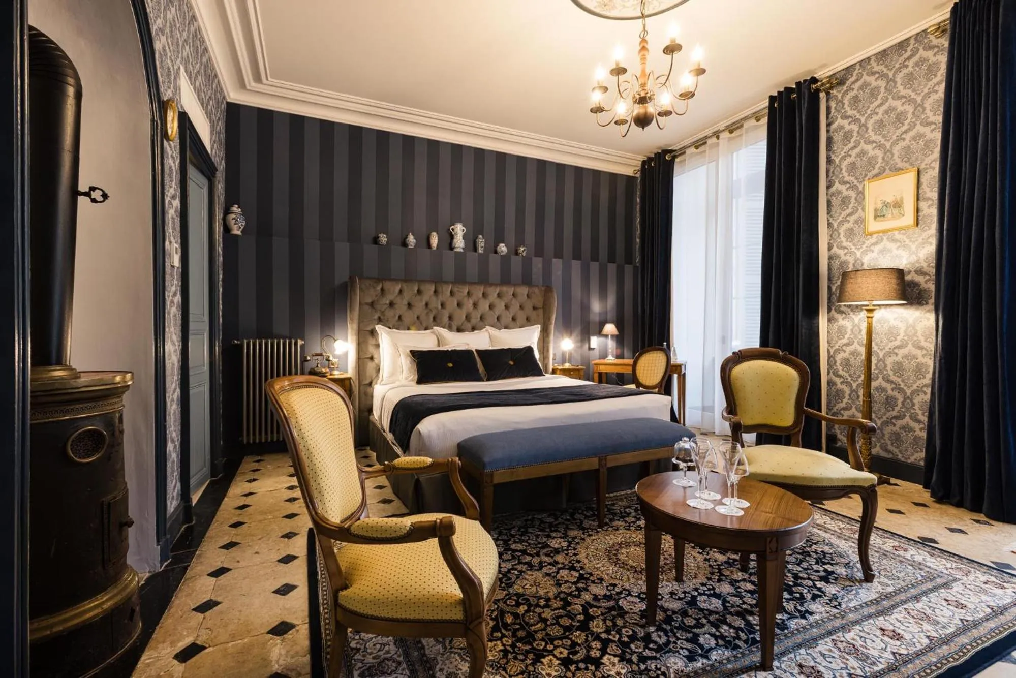 Photo of the whole room, Bed in LE PETIT MANOIR