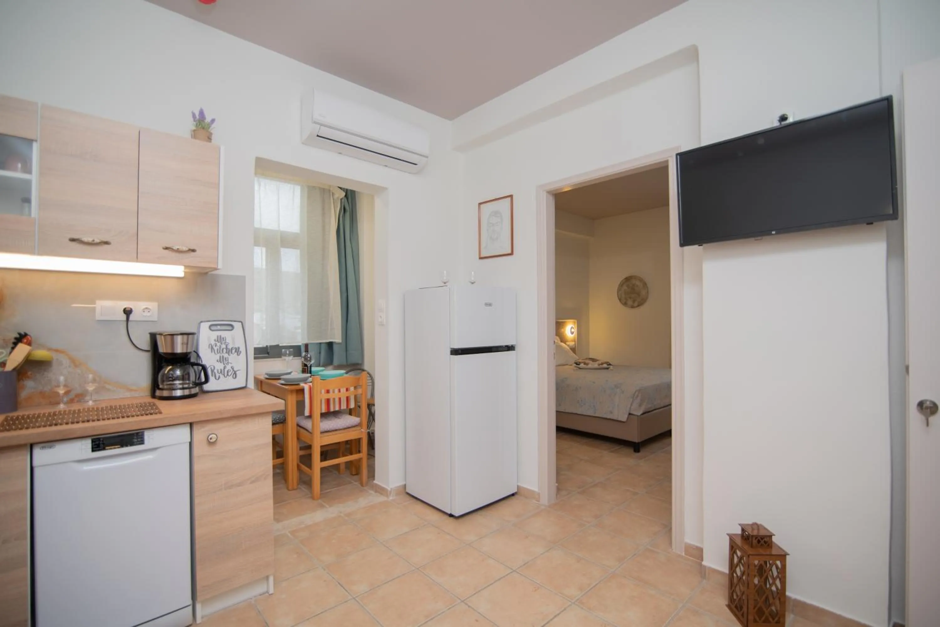 kitchen, Bed in Tsaner Apartment and Rooms