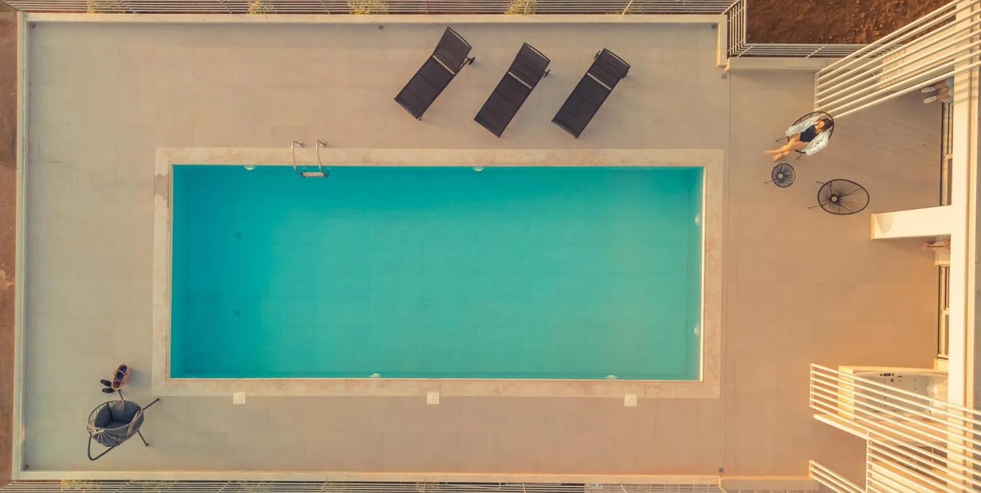 Swimming pool in IO Luxury Pool & Hot Tub Suites